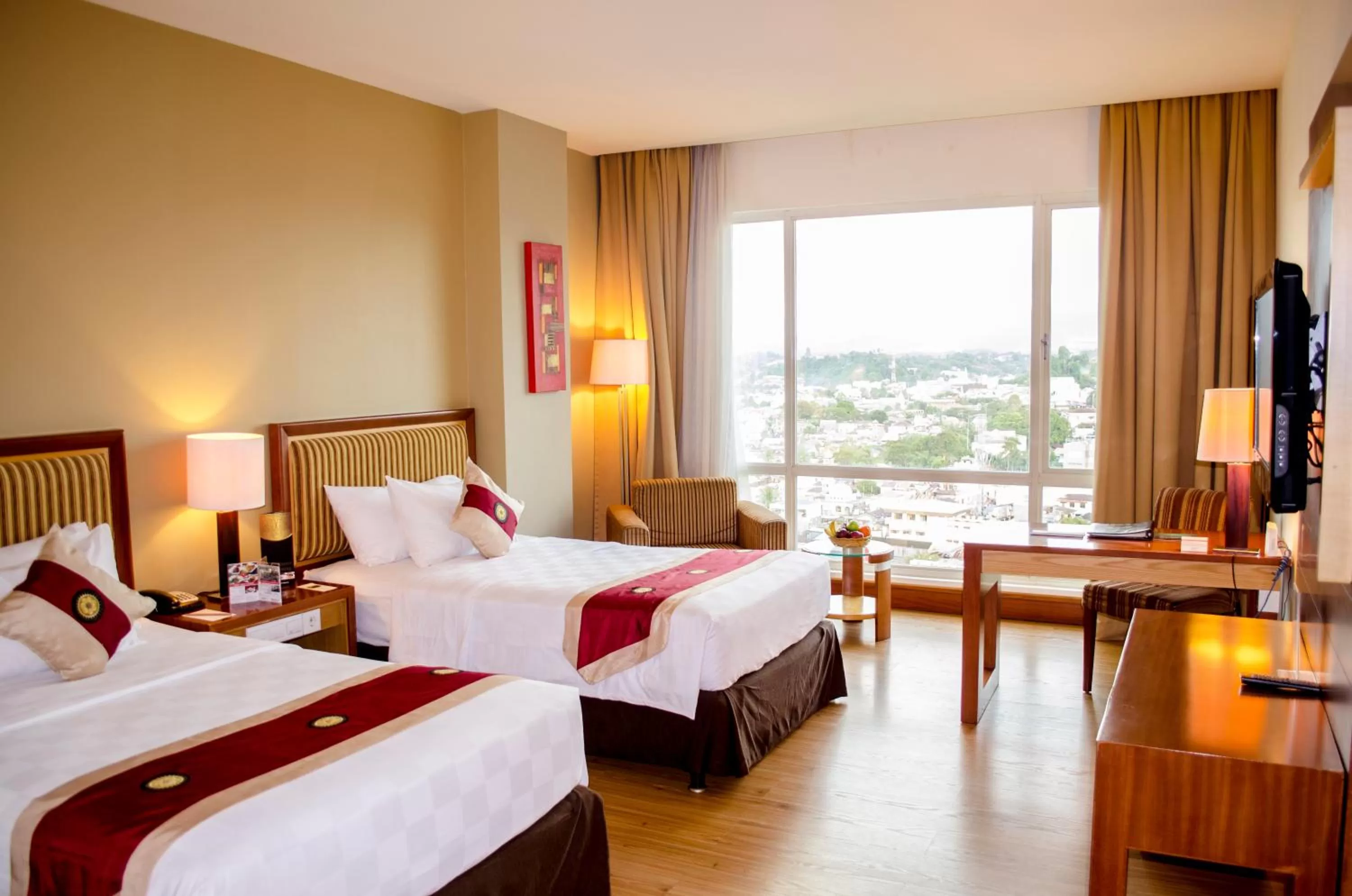 Bed in Swiss-Belhotel Maleosan Manado