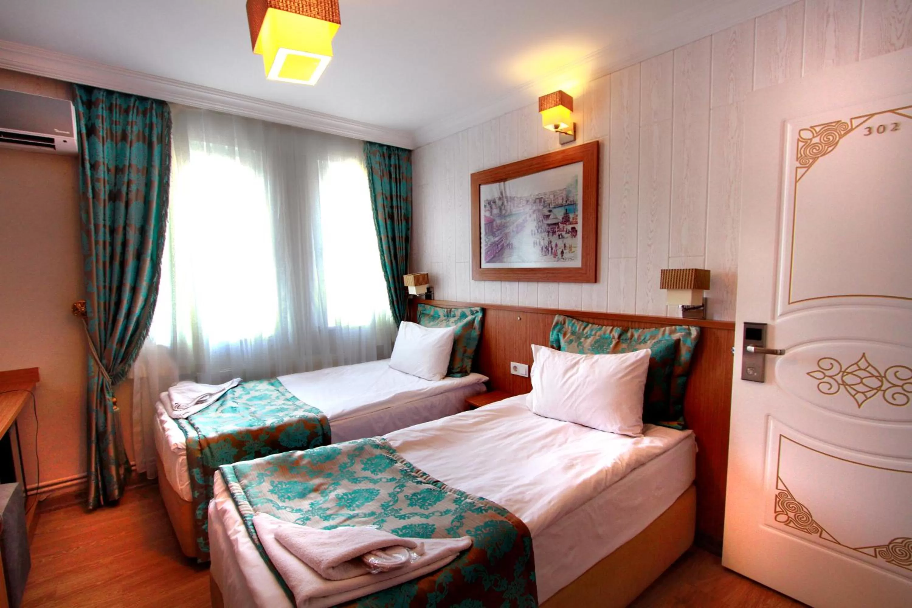 Bed in Agora Boutique Hotel & Bistro