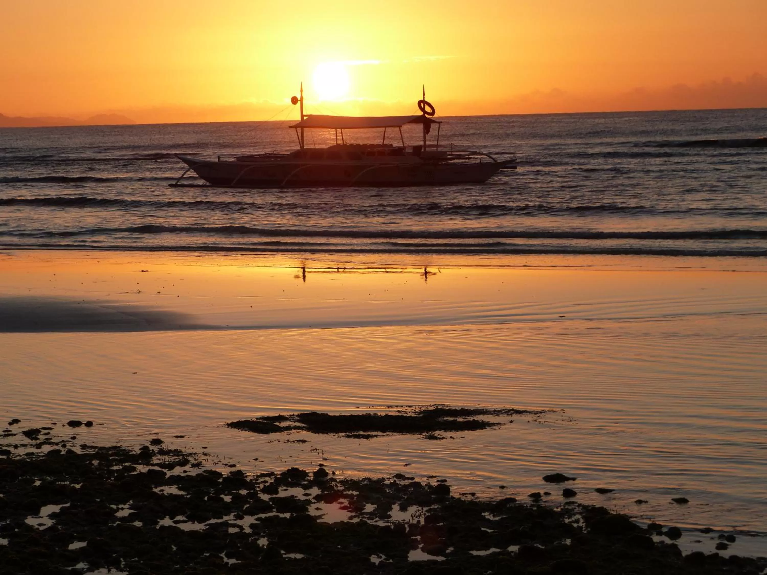 Sunrise in D & B BLUESTAR BEACH RESORT