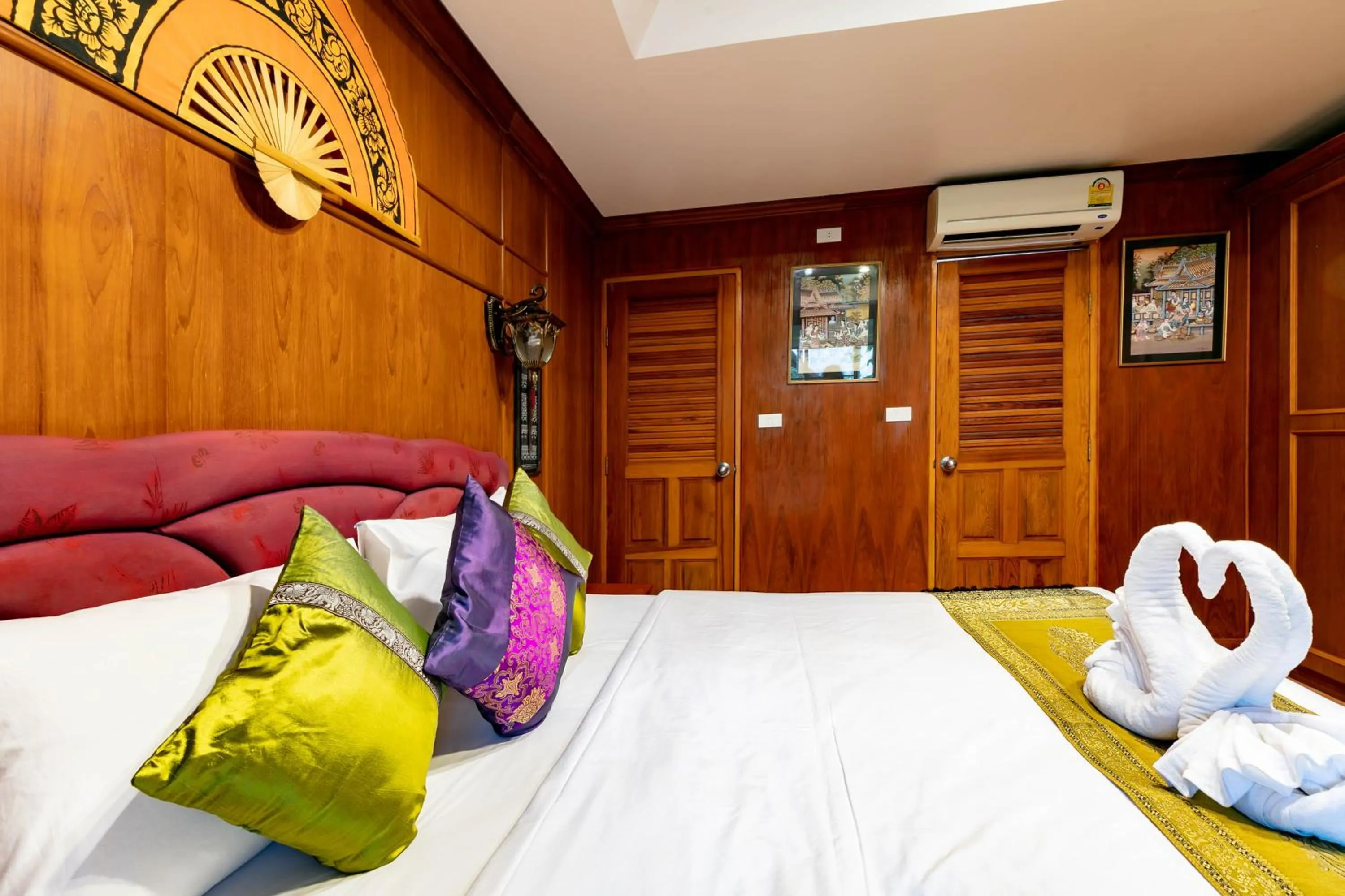 Bedroom, Bed in Royal Phawadee Village Patong - 2 Minutes walk to the beach