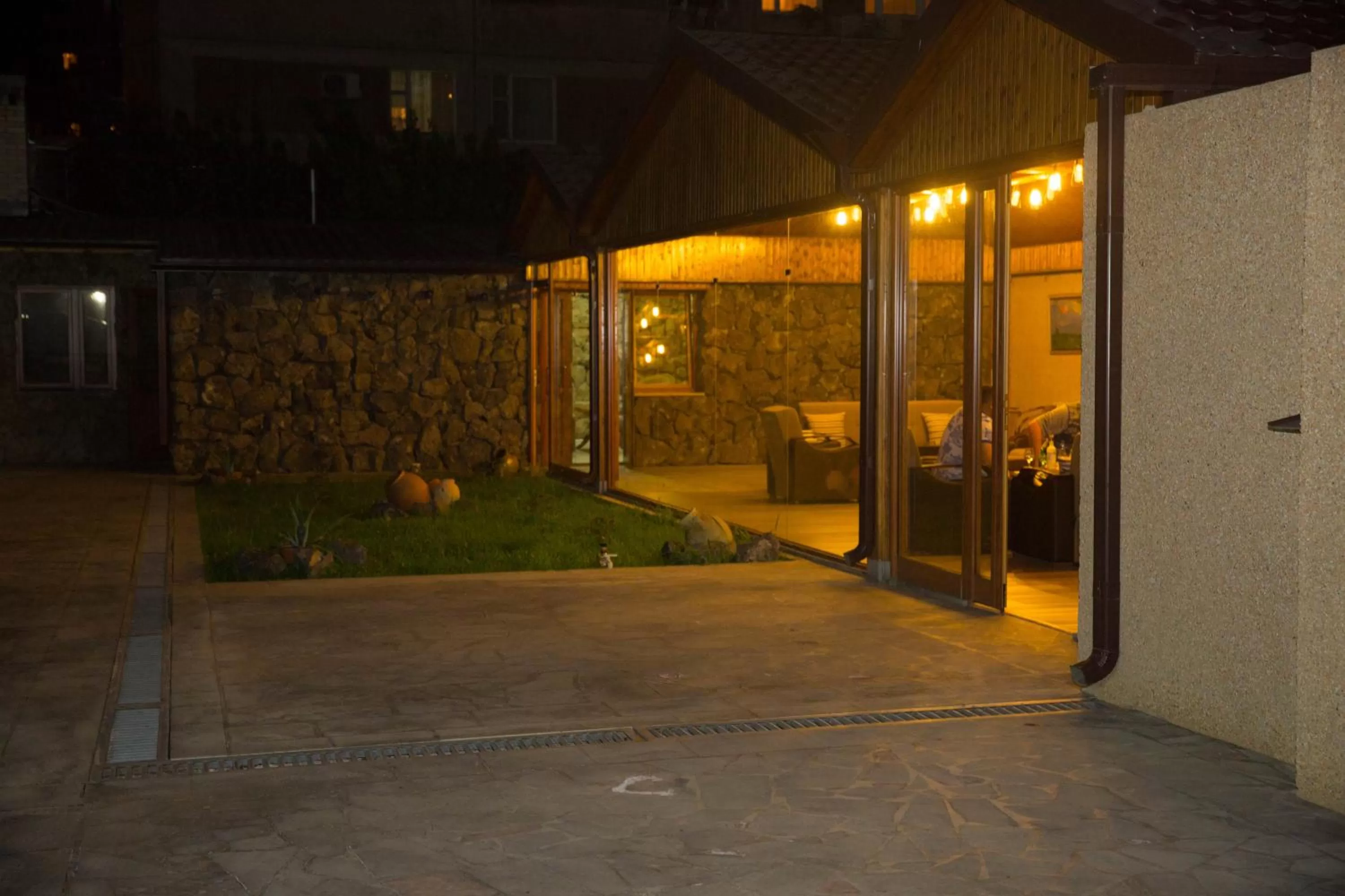 Communal lounge/ TV room, Patio/Outdoor Area in Eridana Hotel