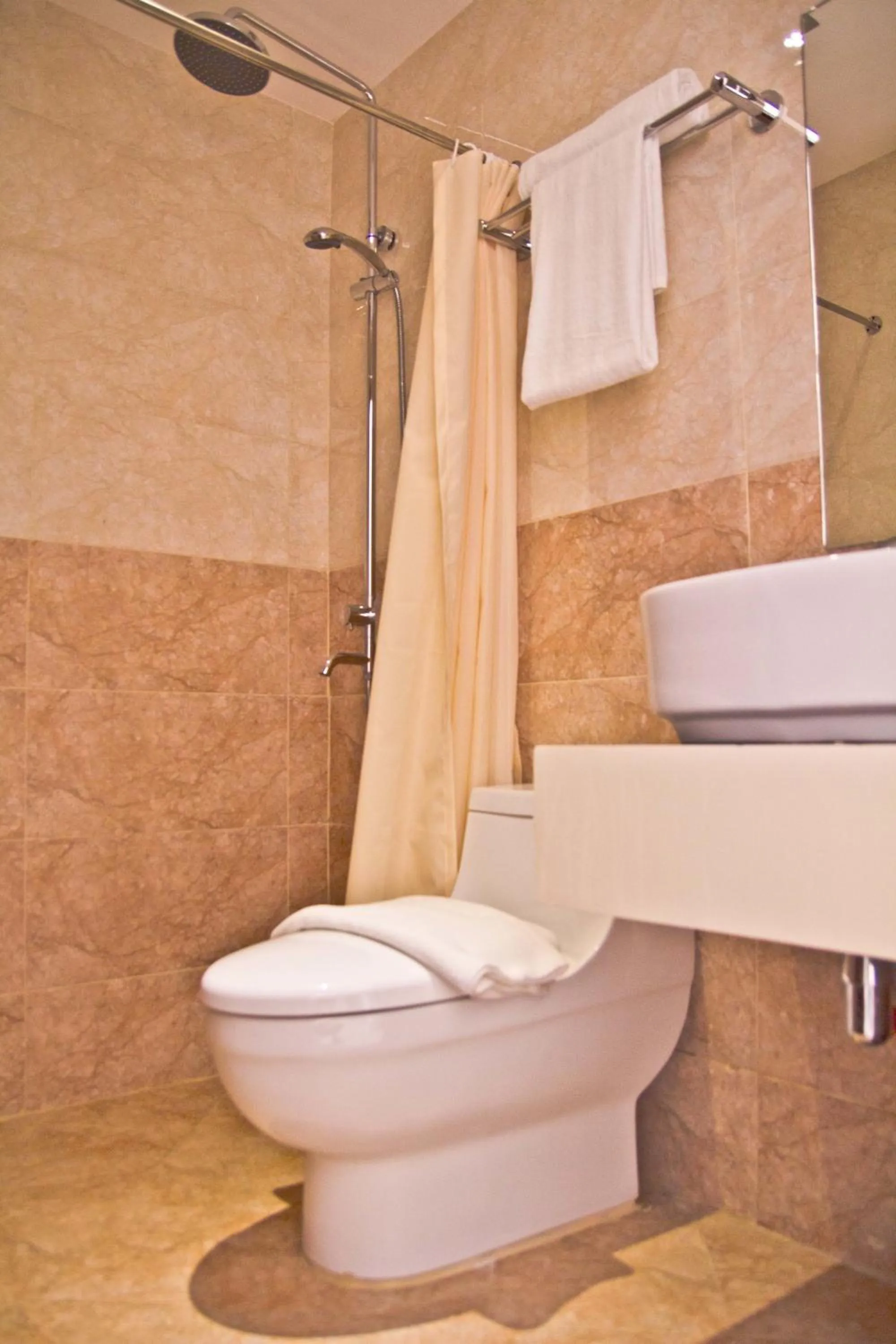 Bathroom in Canberry Hotel