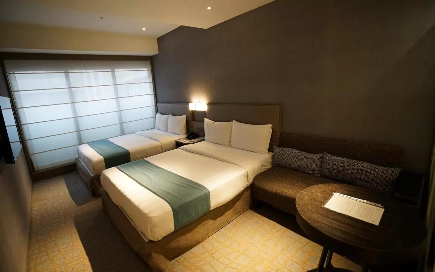 Bed in Hotel Midtown Richardson