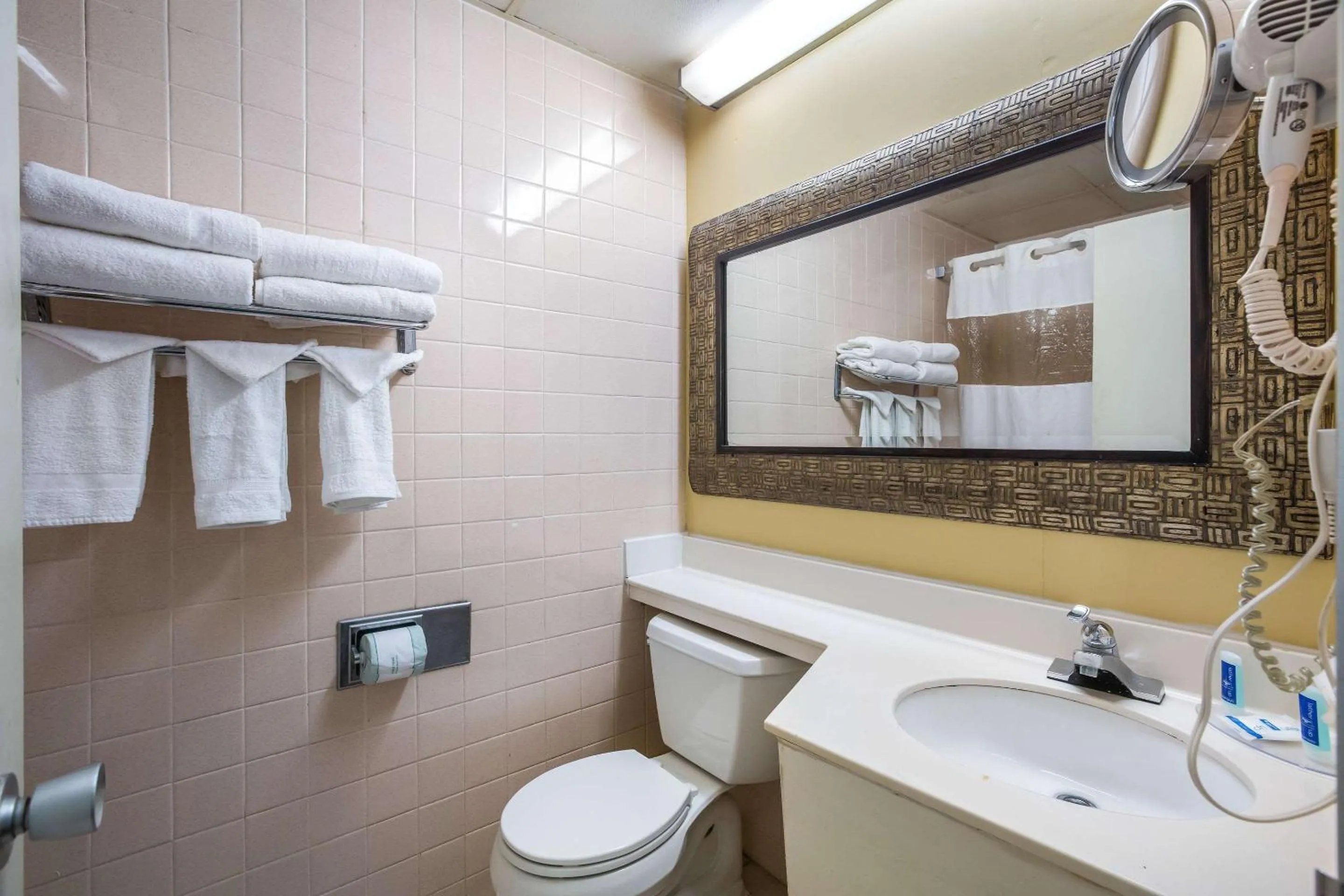 Bathroom in Super 8 by Wyndham Macon GA