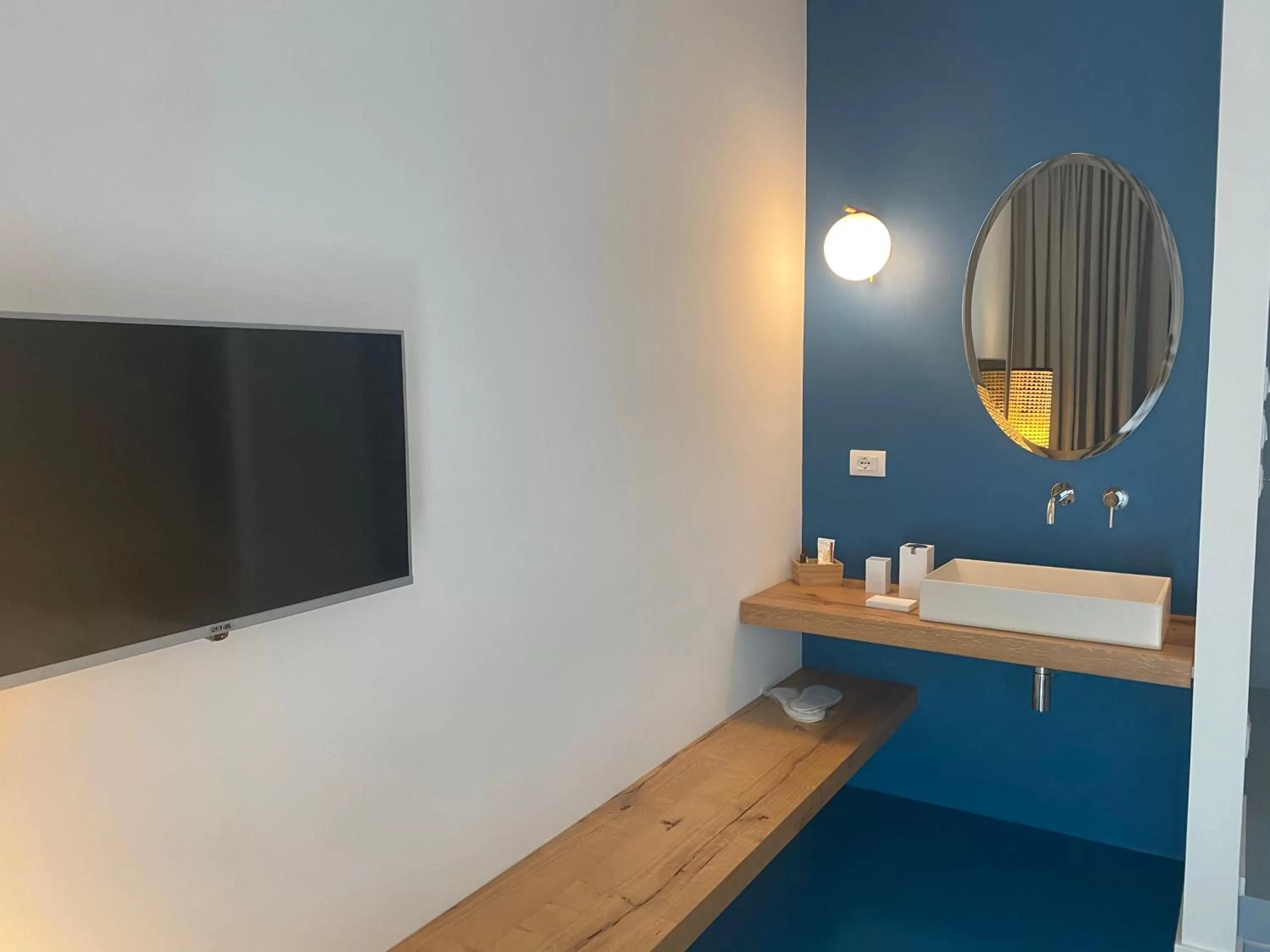 Bathroom, TV/Entertainment Center in Near Ortigia