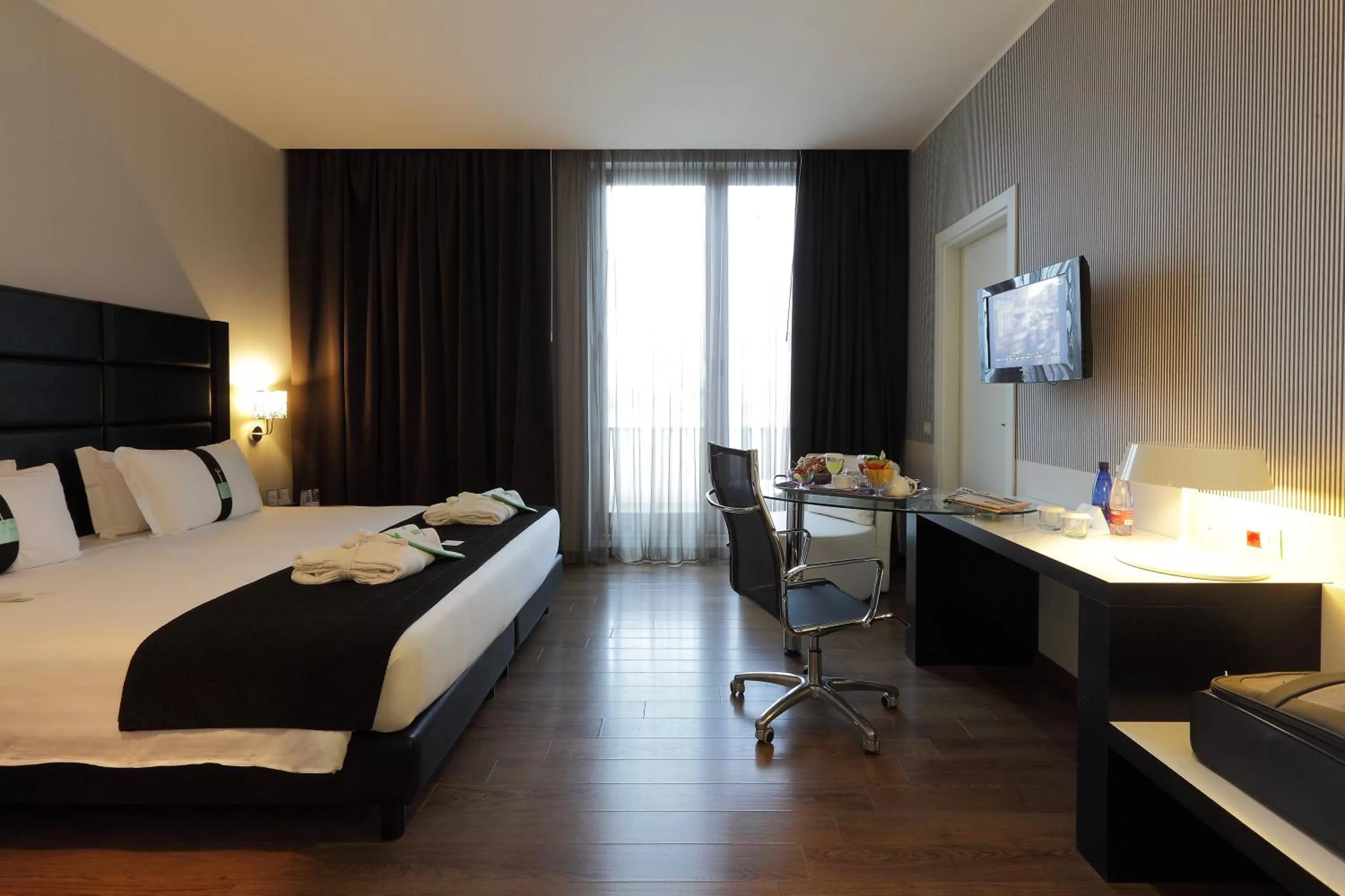 Photo of the whole room, Bed in Holiday Inn Genoa City by IHG