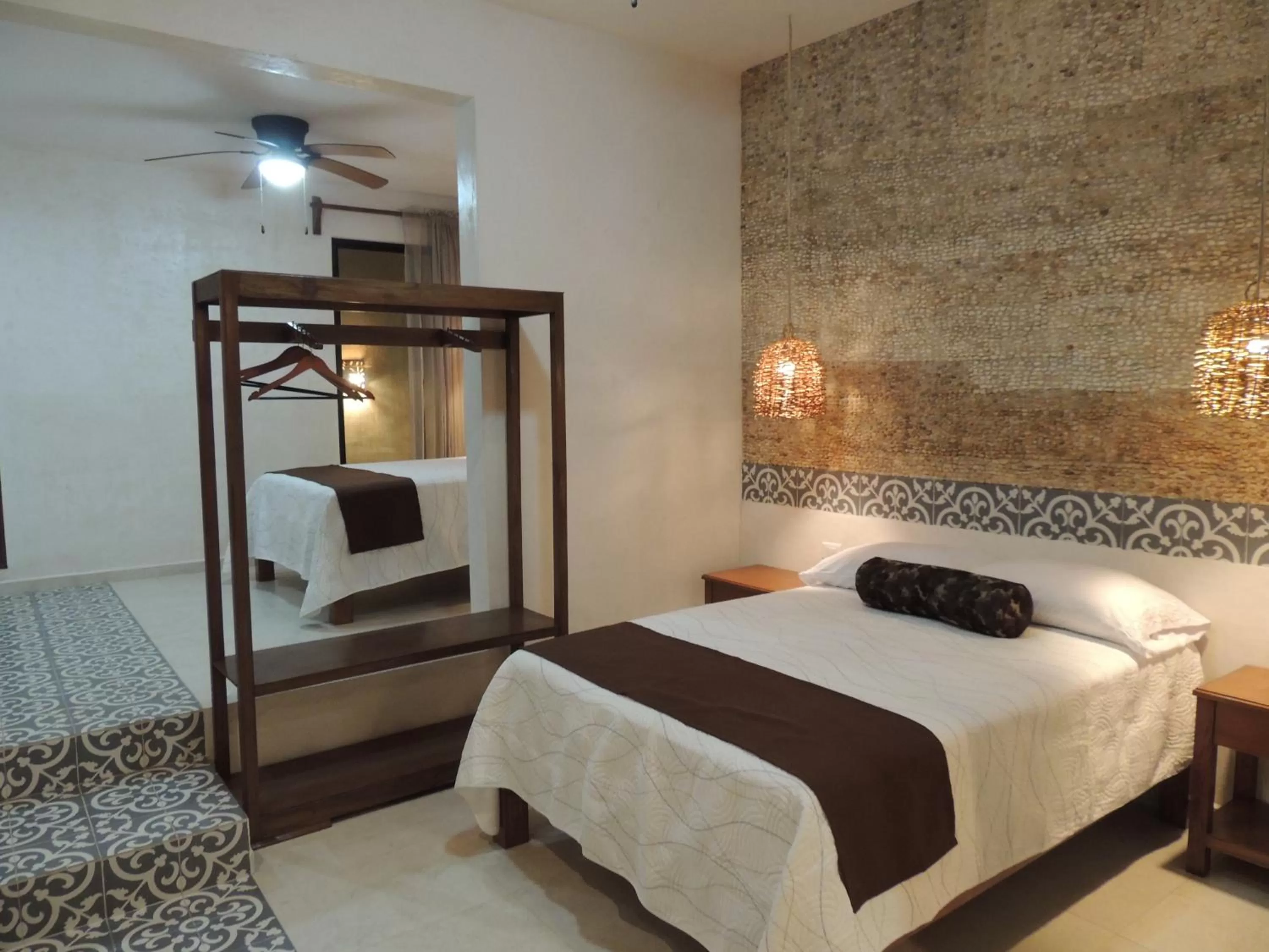 Bed in Hotel Boutique Bugambilias