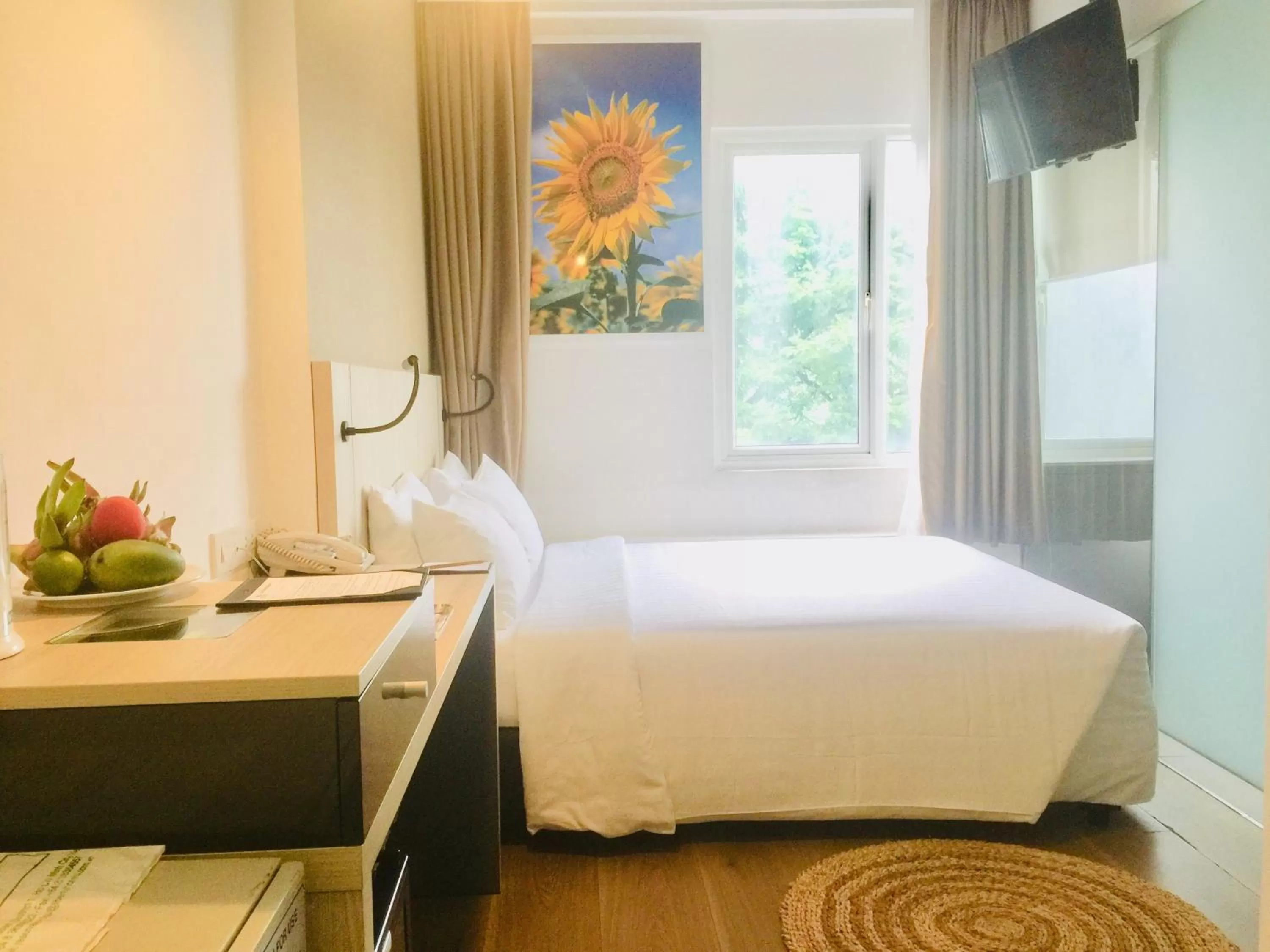 Bed in Liberty Hotel Saigon Greenview