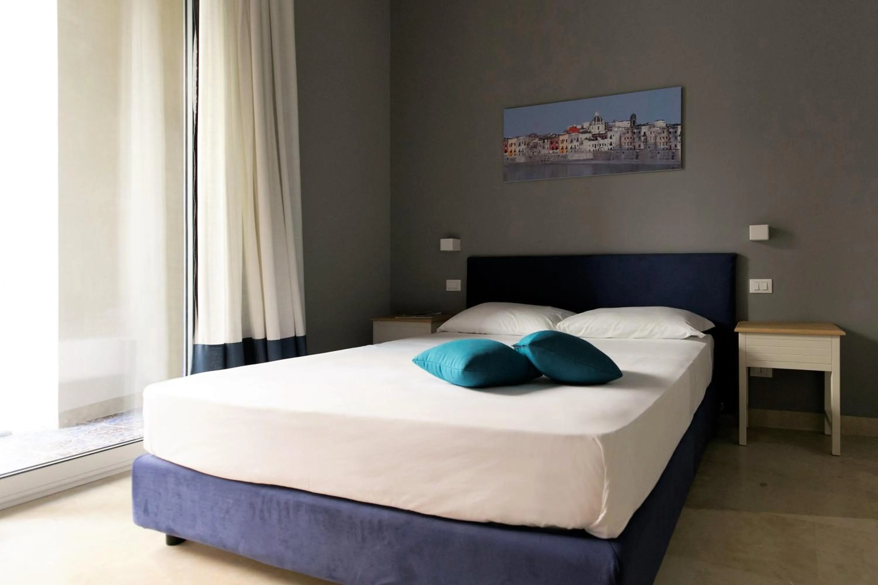 Bedroom, Bed in ZIBIBBO SUITES & ROOMS - Aparthotel in Centro Storico a Trapani