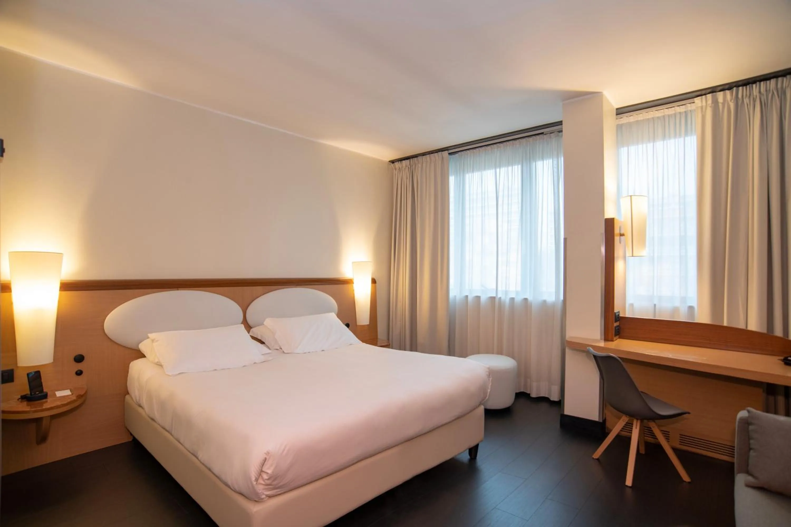 Bed in Mercure Roma West