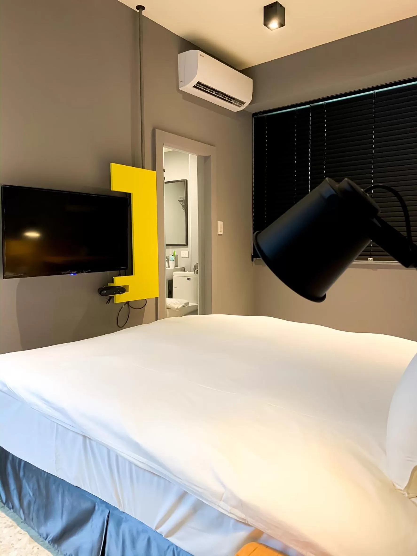 Bed in Raise Hotel Taichung