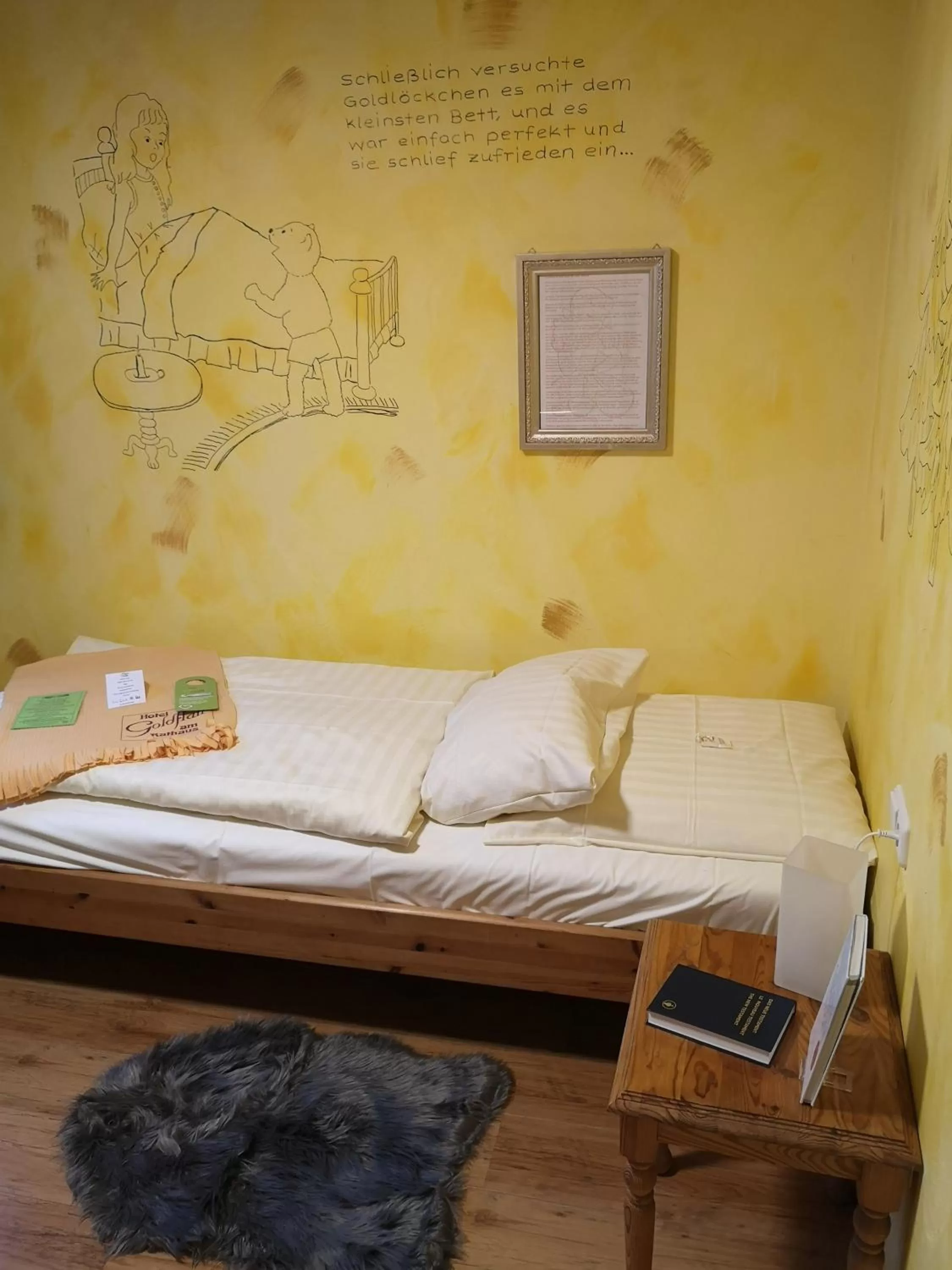 Photo of the whole room, Bed in Hotel Goldflair am Rathaus