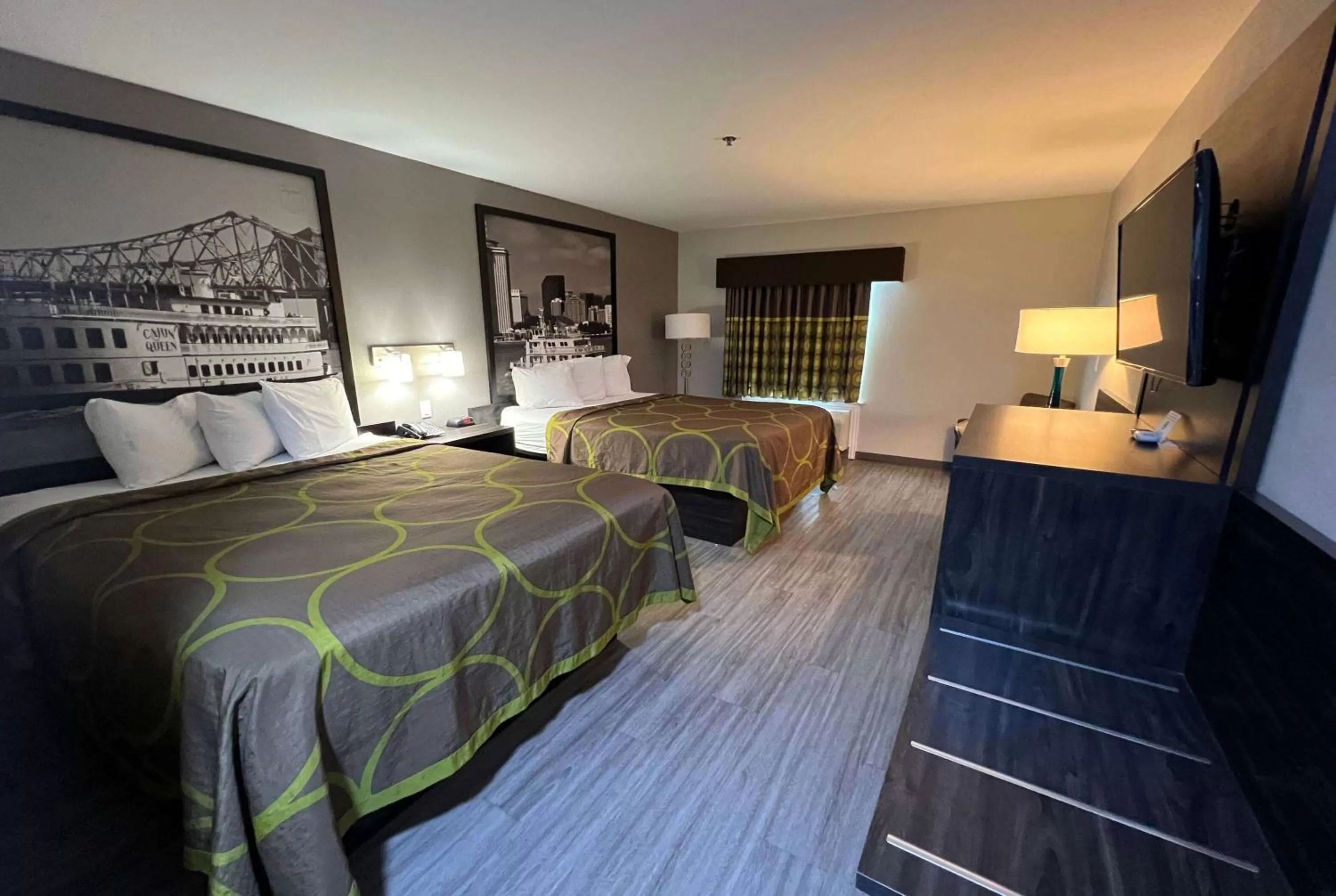 Photo of the whole room, Bed in Super 8 by Wyndham Lake Charles/Sulphur