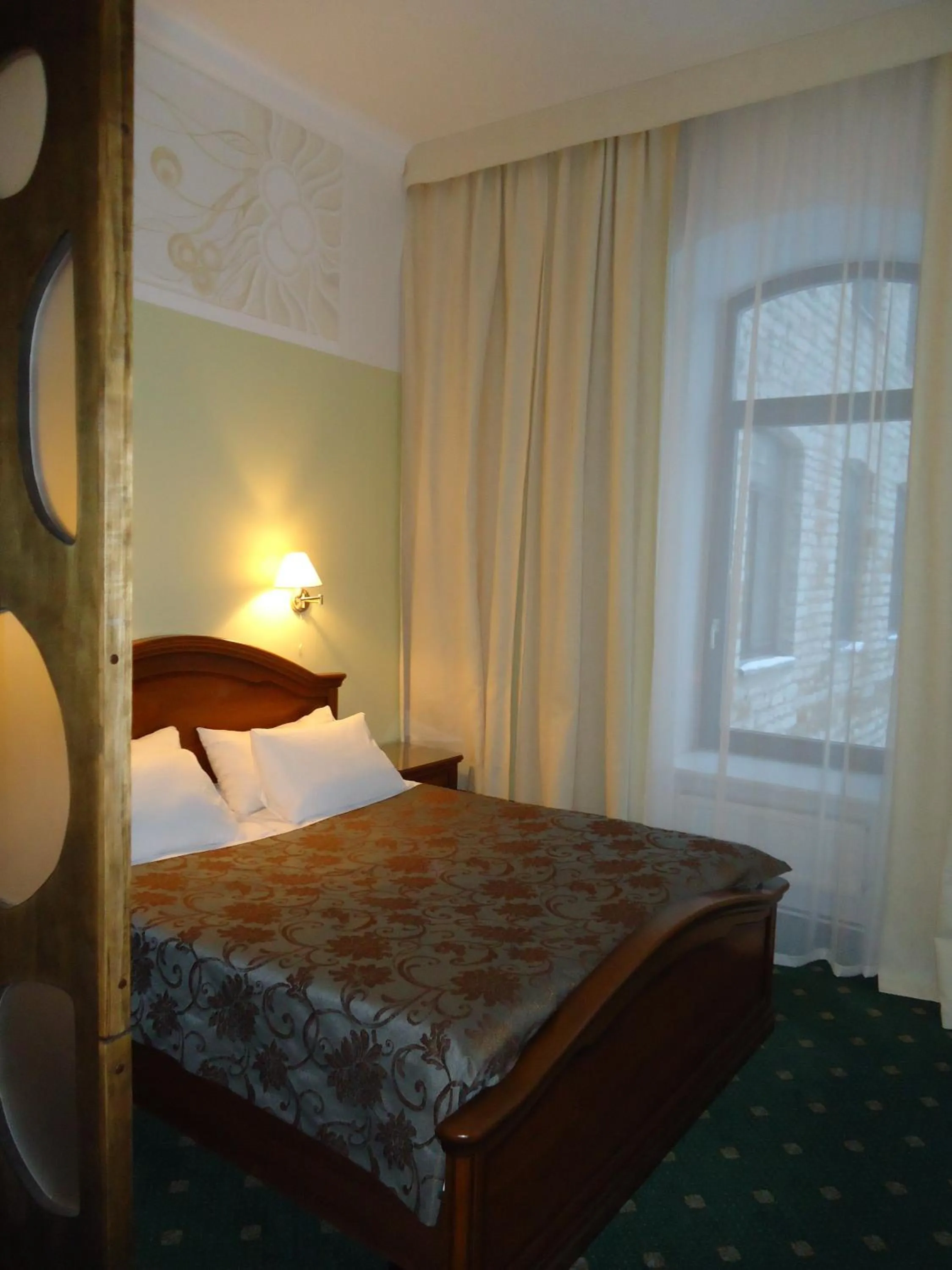 Bed in Hotel St. Barbara