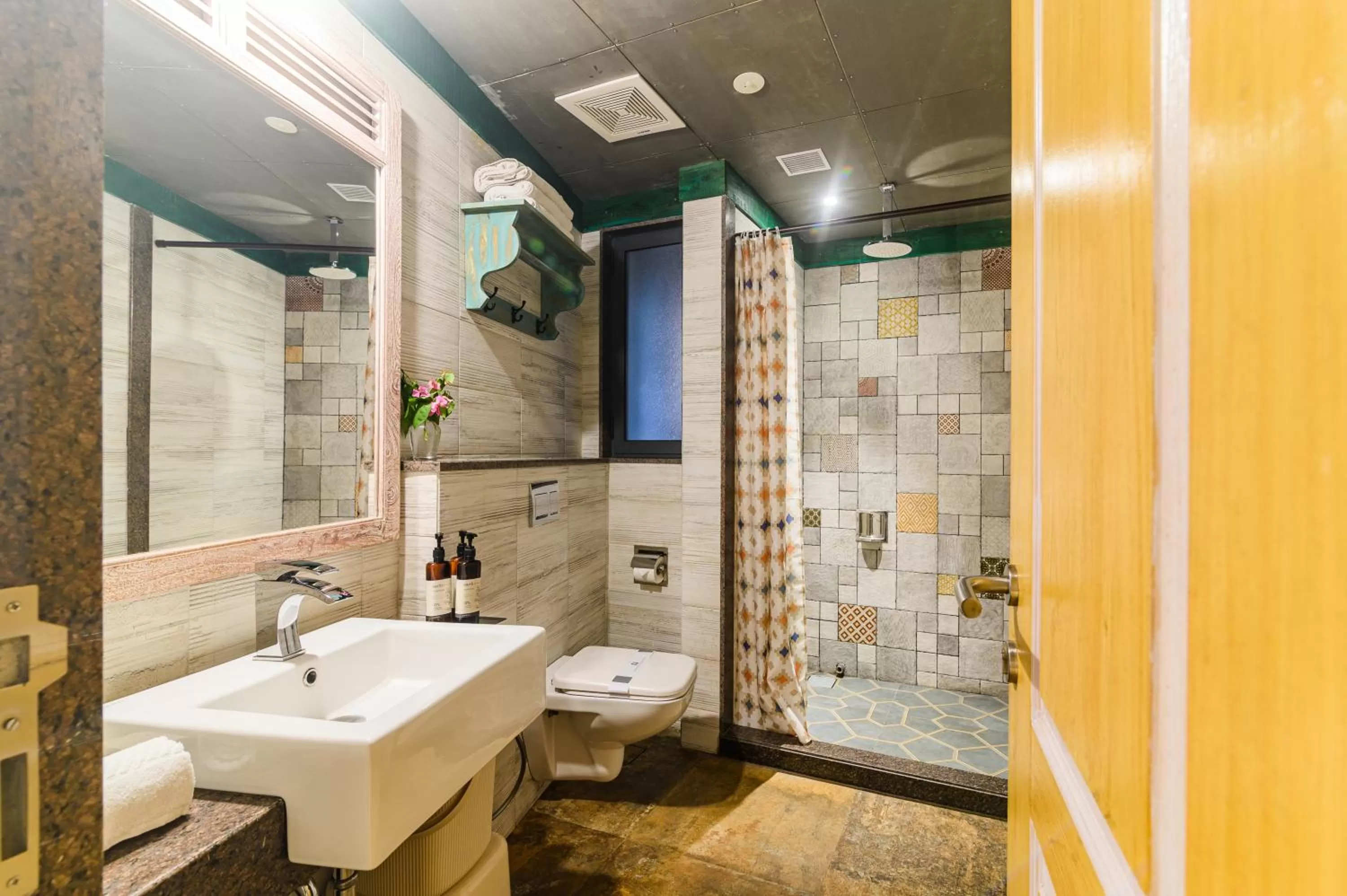 Toilet in Bougainvilla Apartment