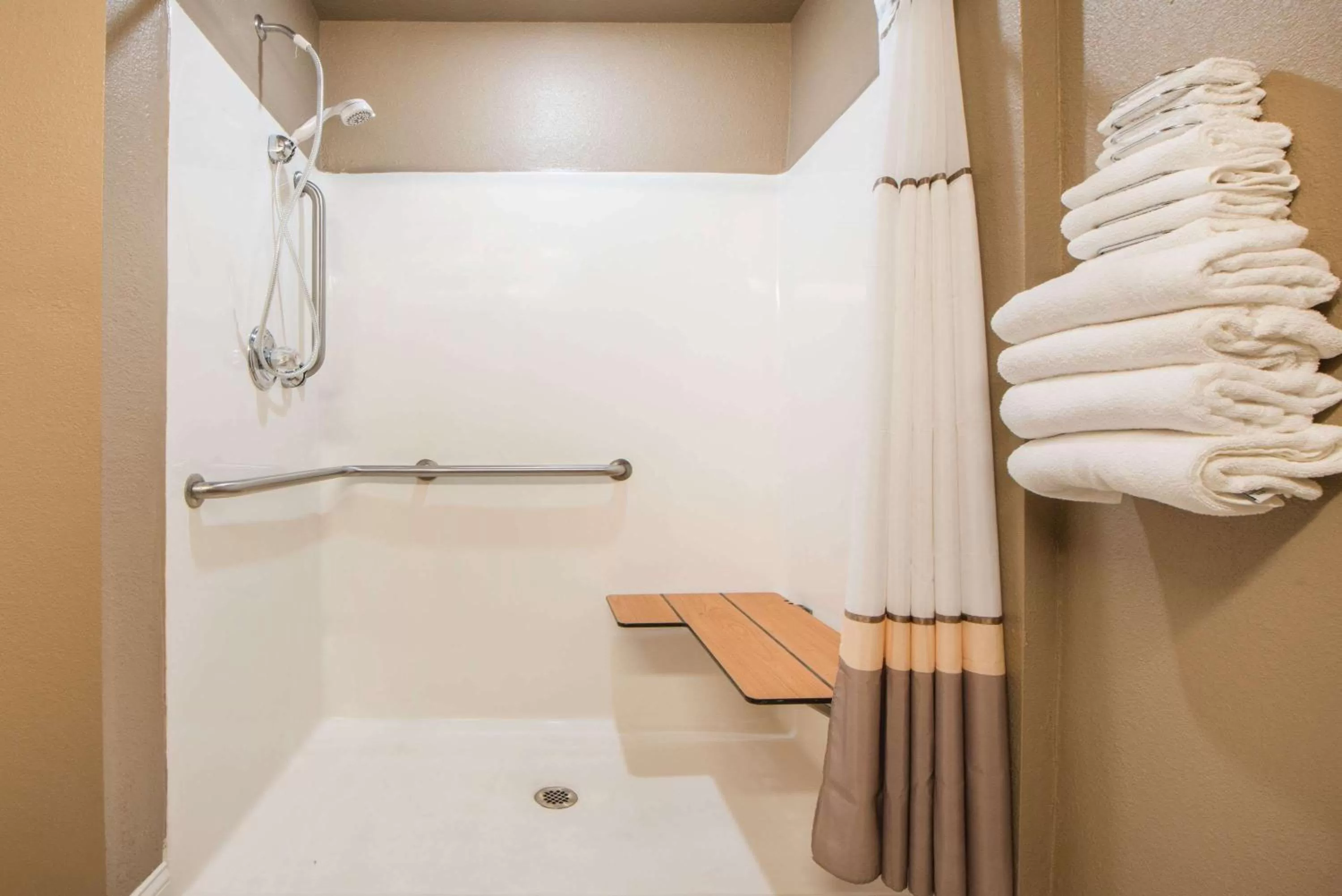 Shower in Microtel Inn and Suites By Wyndham Miami OK