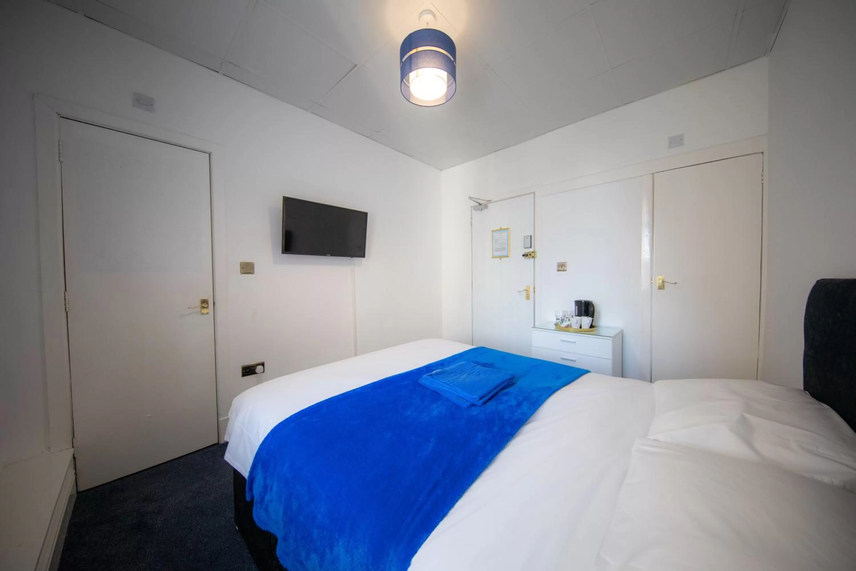 Bed in The Adonis Hotel