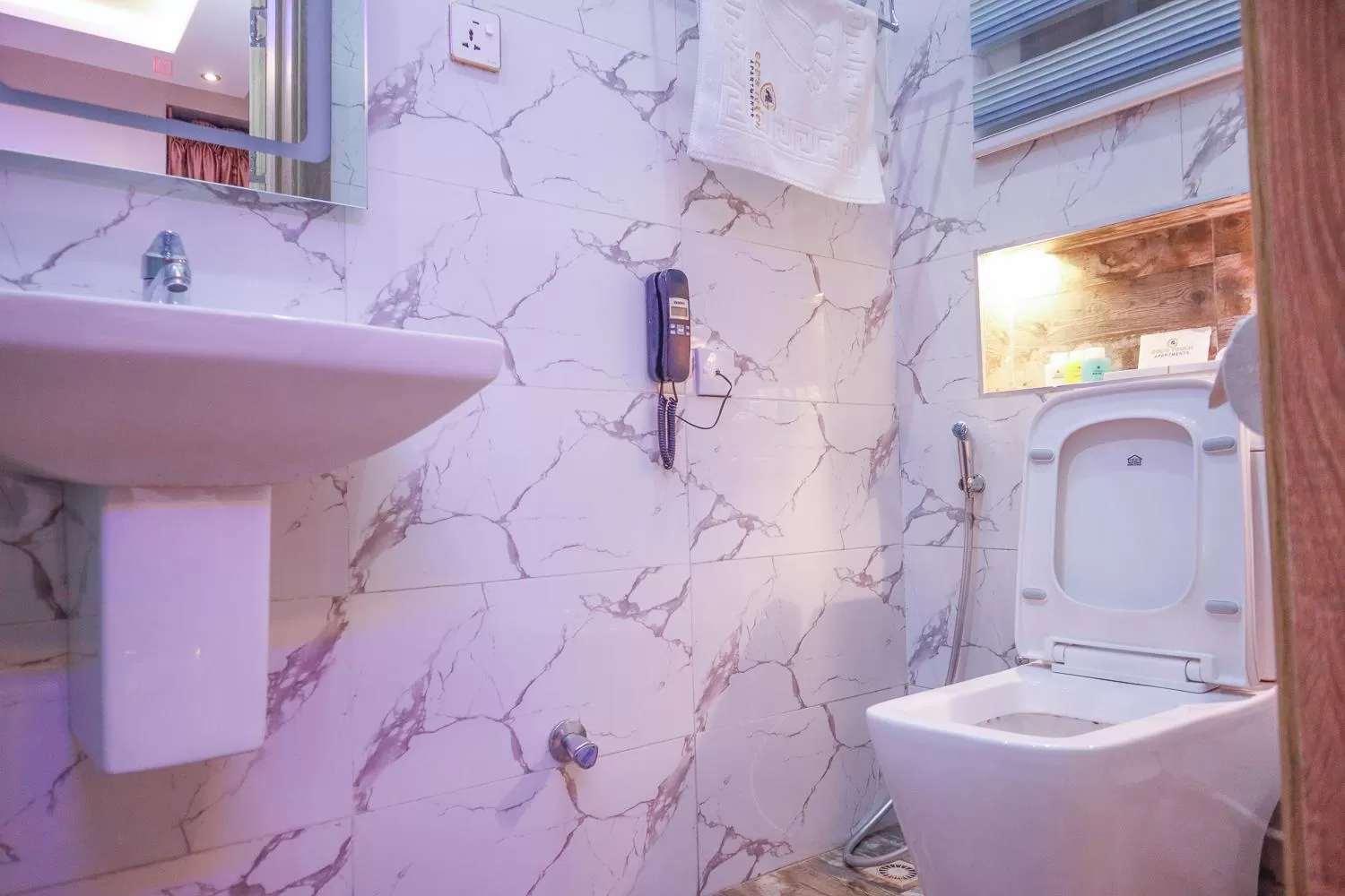 Shower in God's Touch Apartments Signature