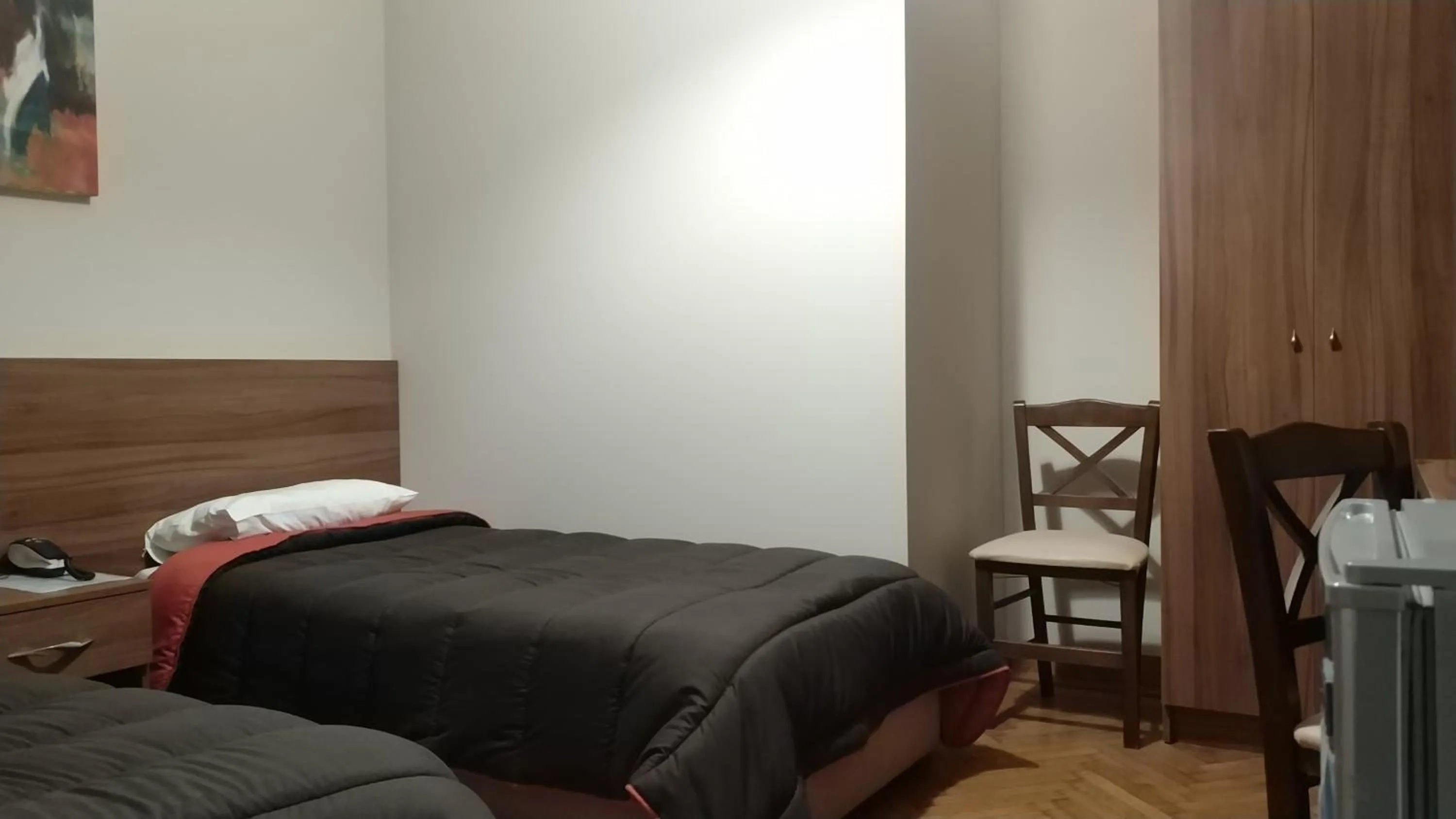 Bed in Ambrosia Suites