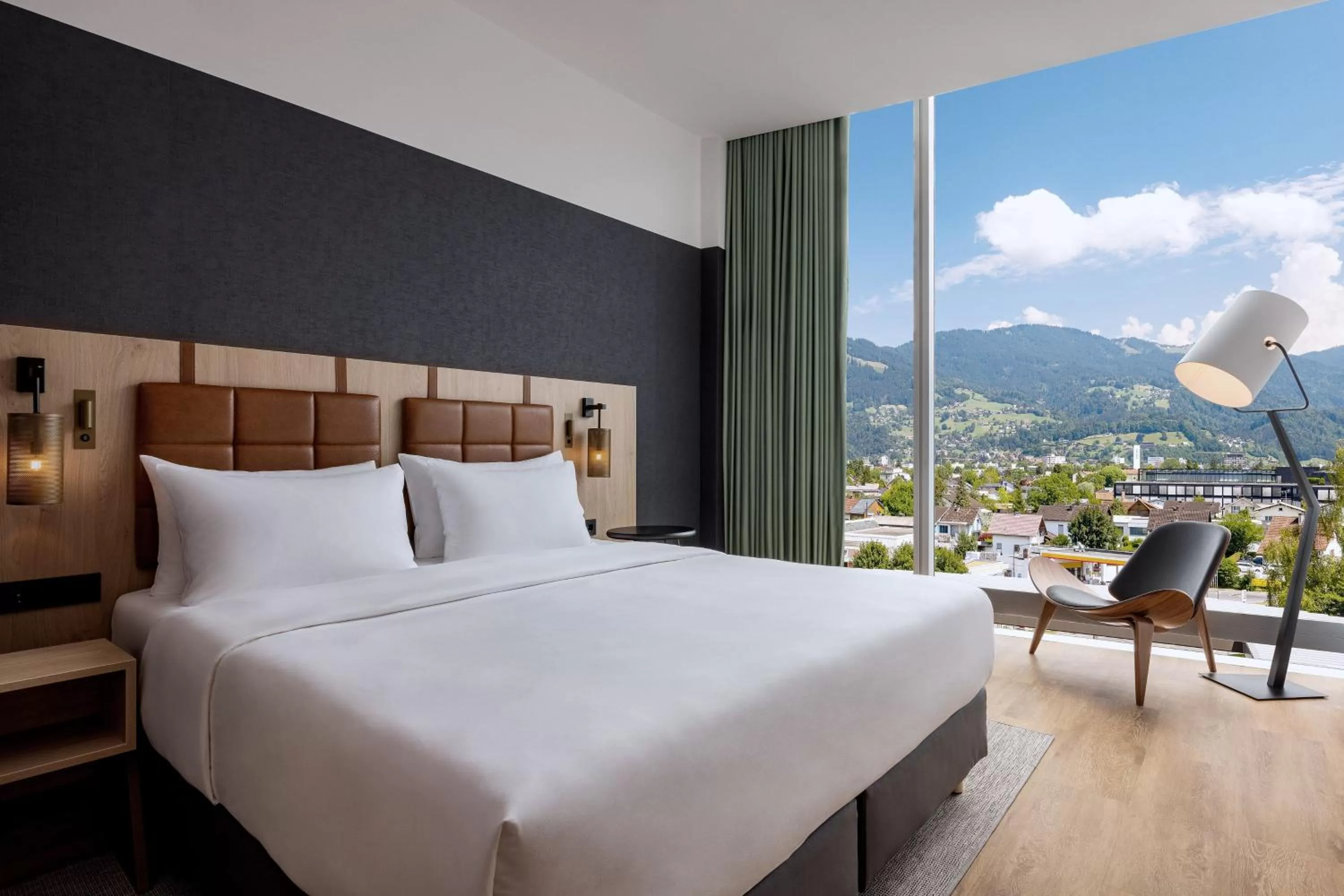 Living room, Bed in Four Points by Sheraton Panoramahaus Dornbirn