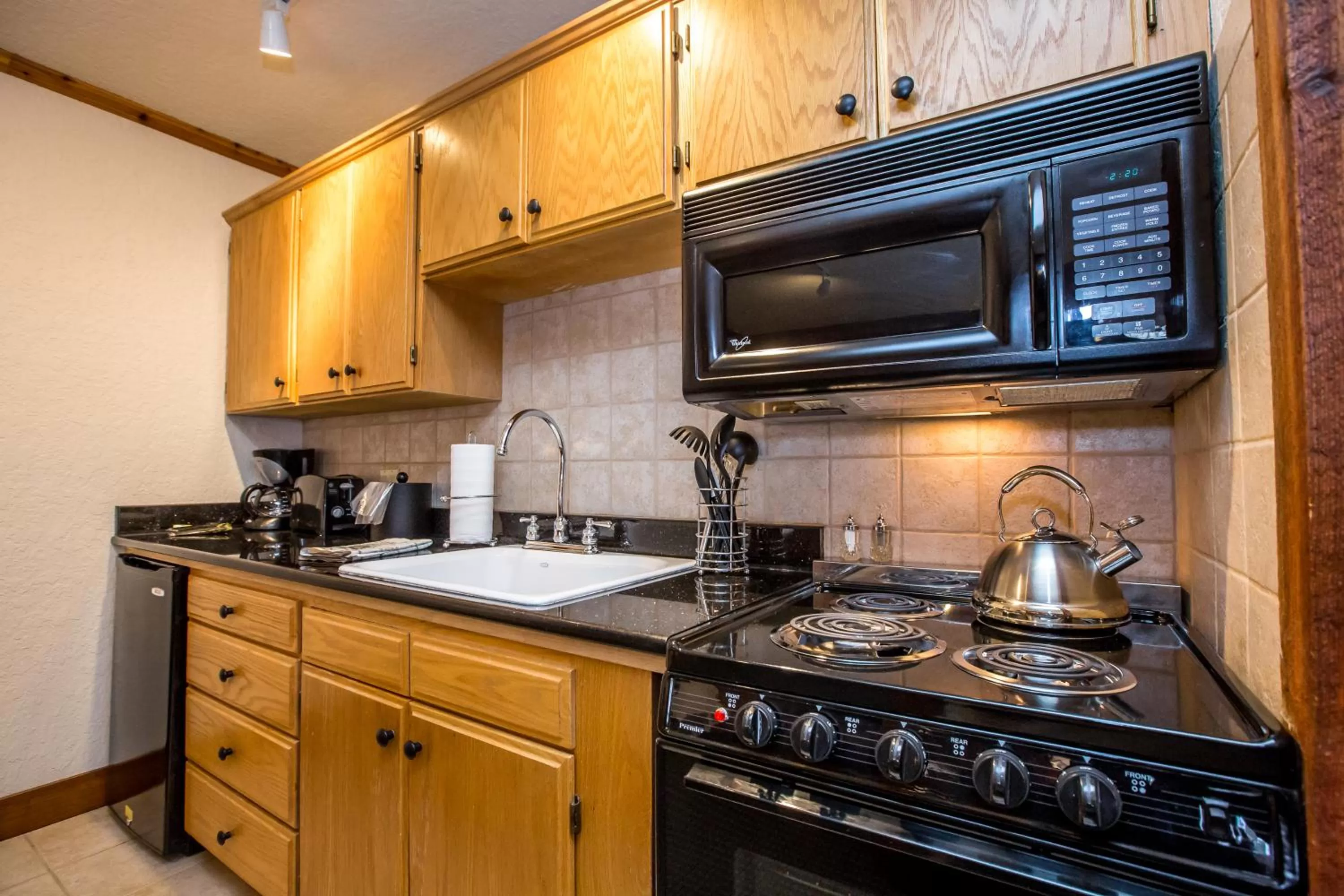 Kitchen or kitchenette in Kandahar Lodge at Whitefish Mountain Resort