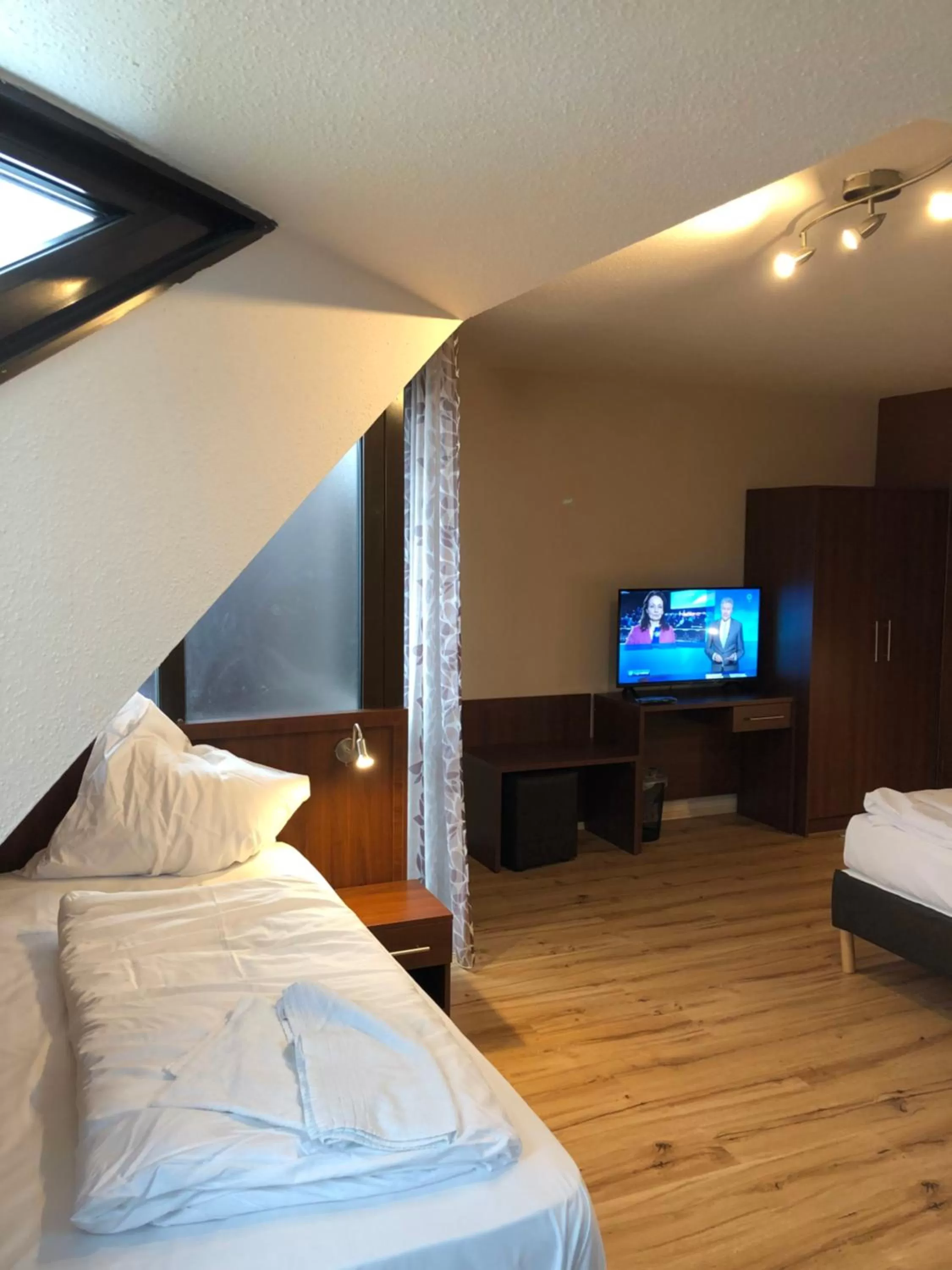 Bed in Hotel Poseidon