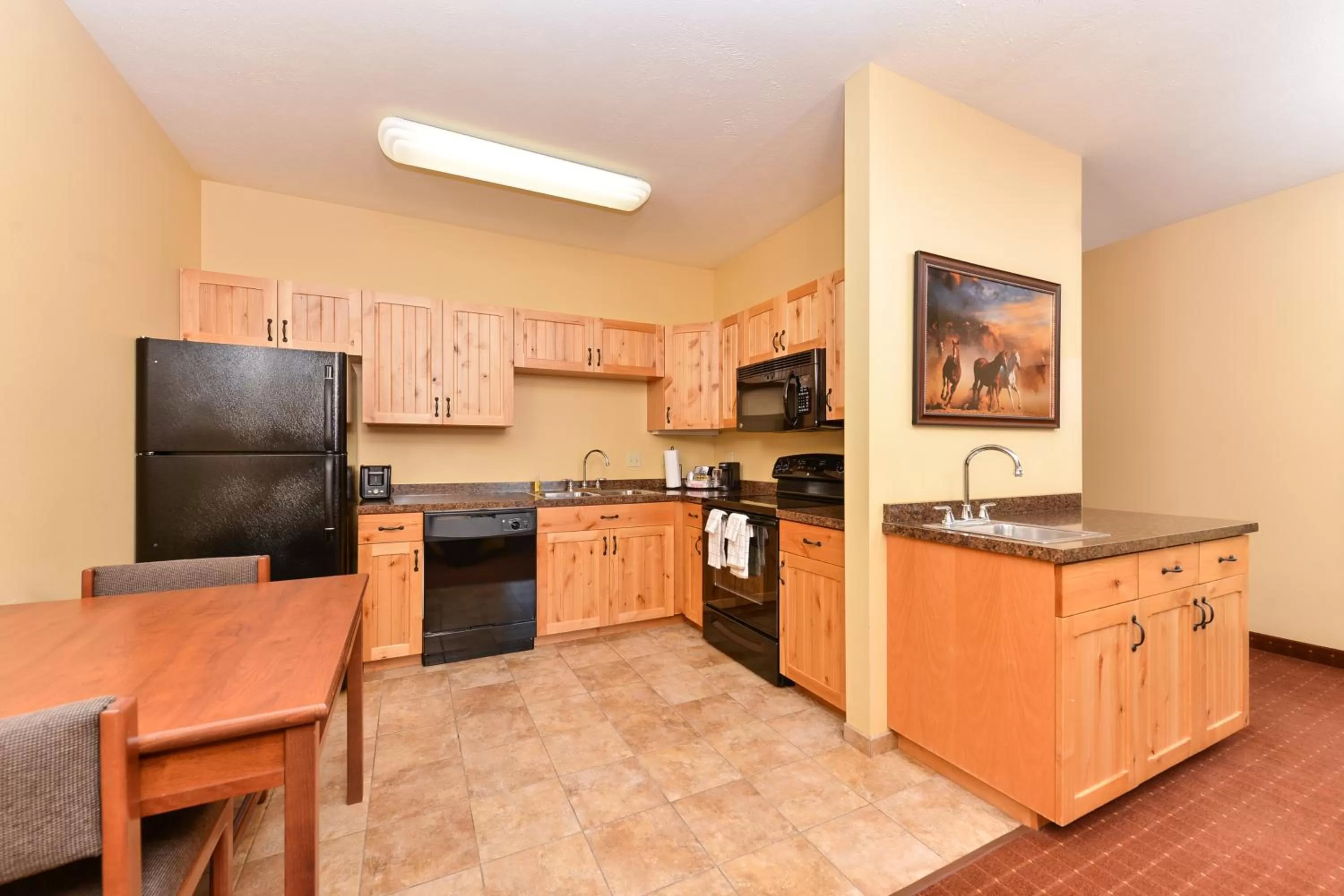 Kitchen or kitchenette in AmericInn by Wyndham Fargo Medical Center