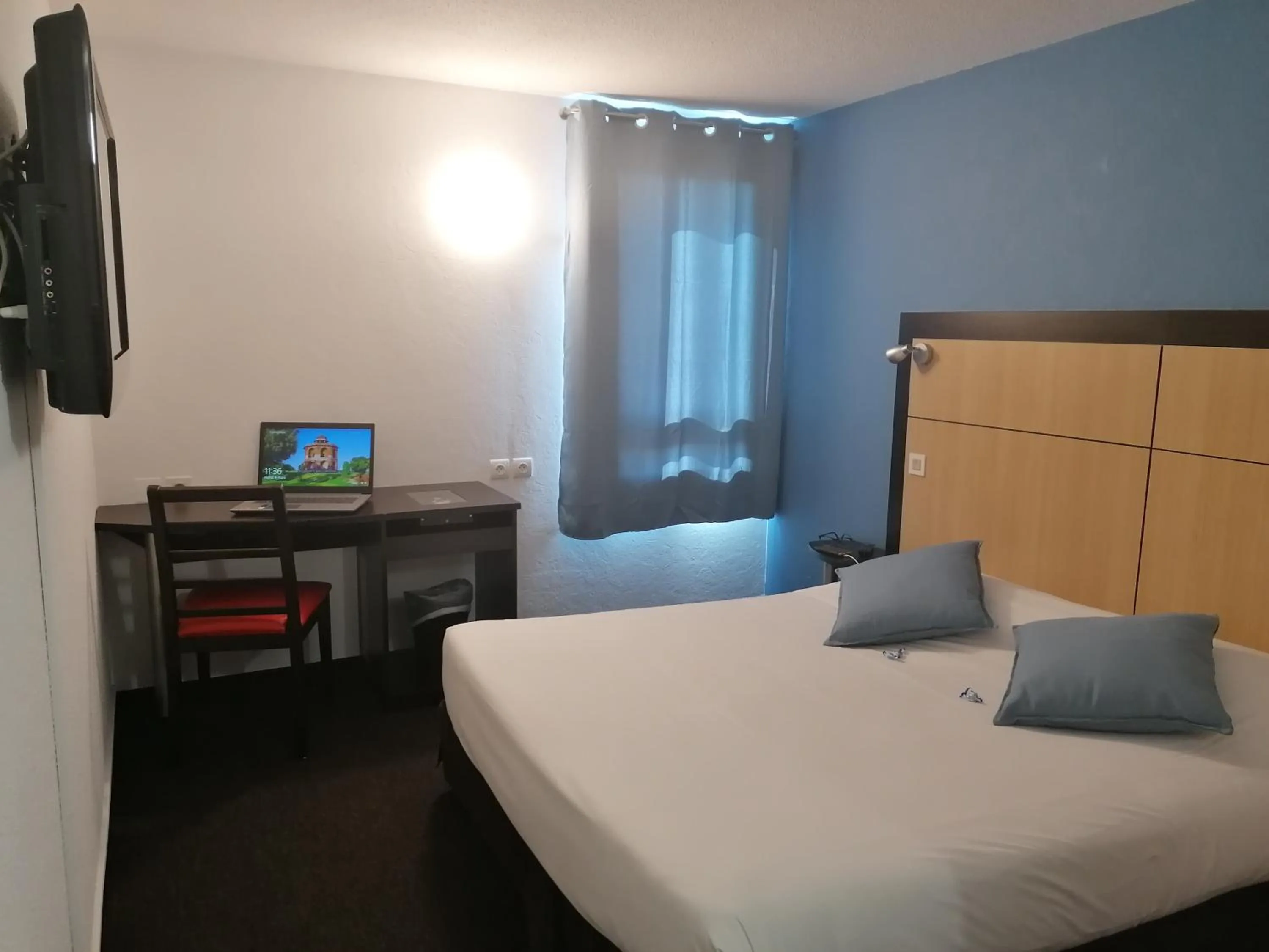 Bed in Enzo Hotels Vierzon by Kyriad Direct