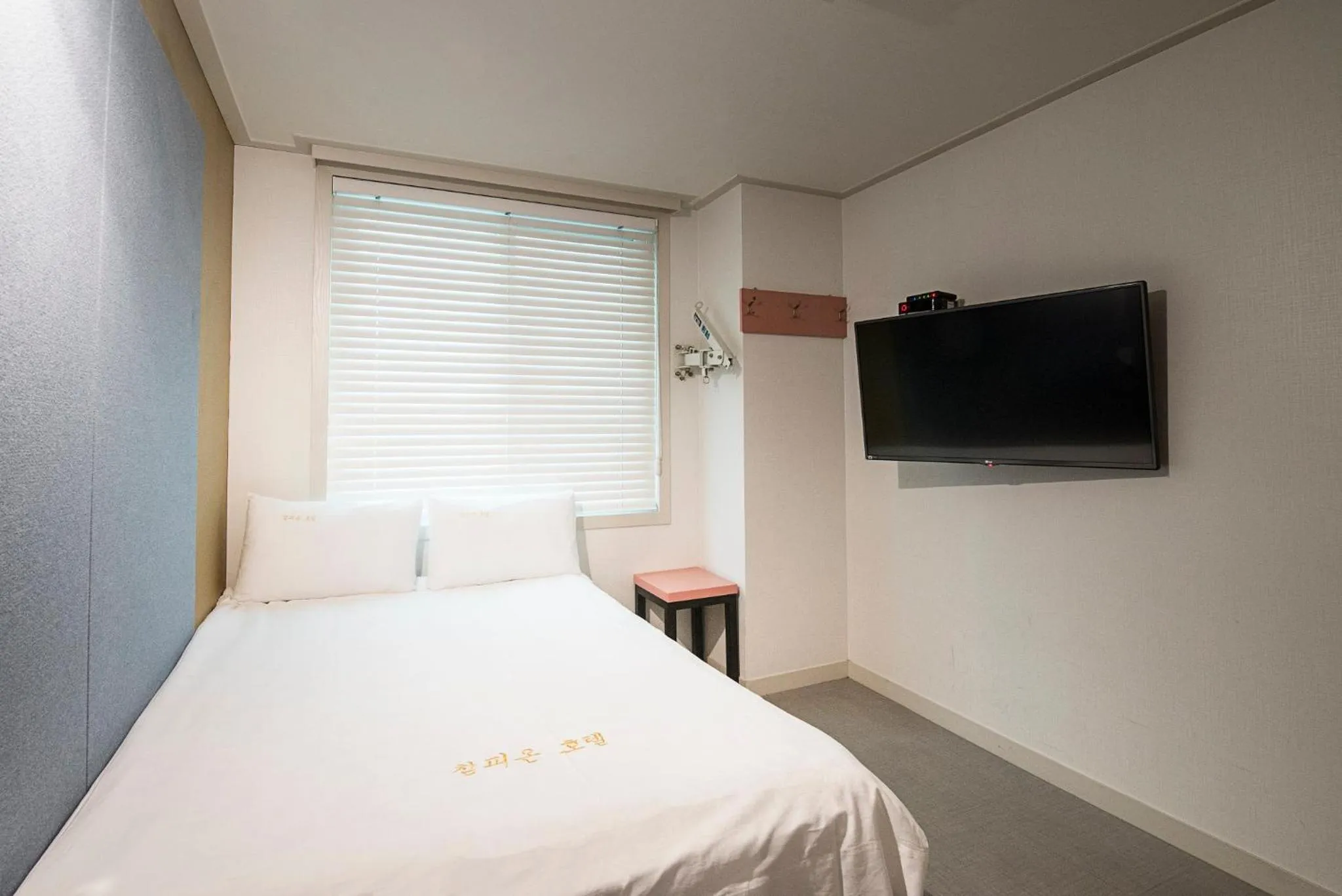 Bed in Champion Hotel