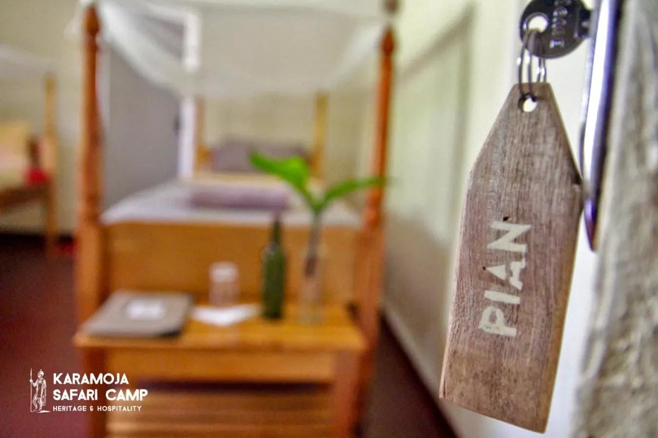 Bed in Kara-Tunga Safari Camp