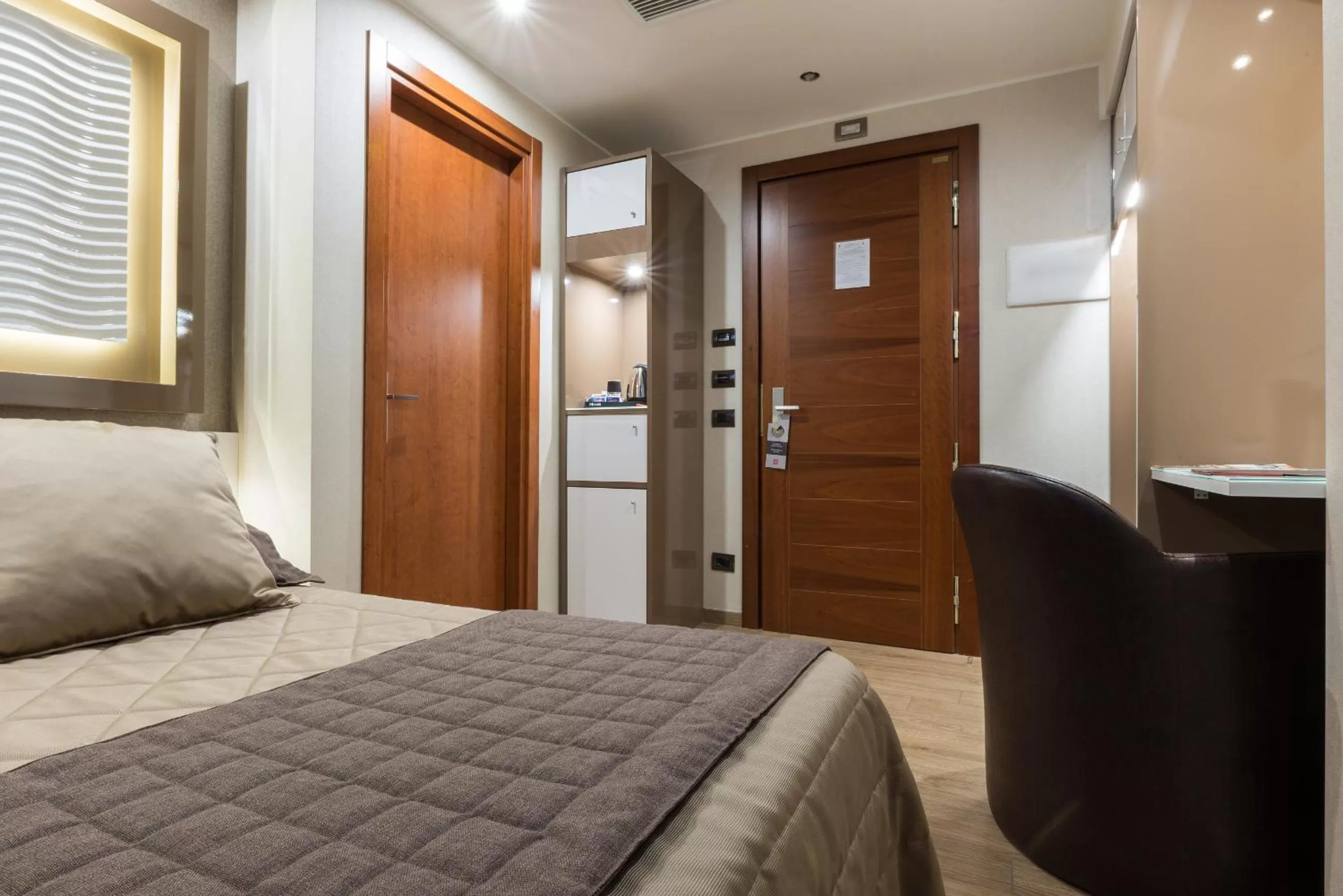 Bed in Magri's Hotel