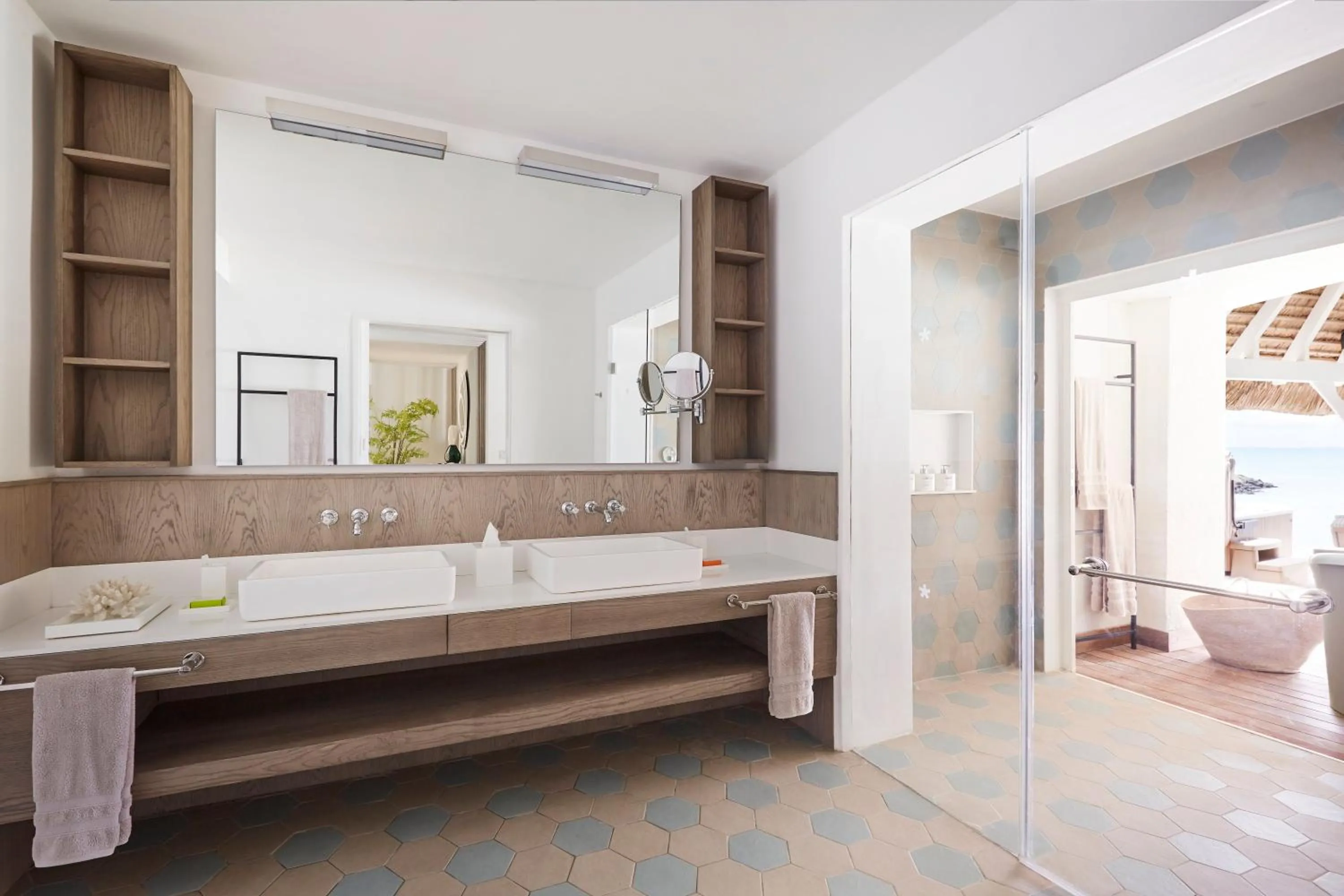 Bathroom, Bed in LUX* Grand Gaube Resort & Villas