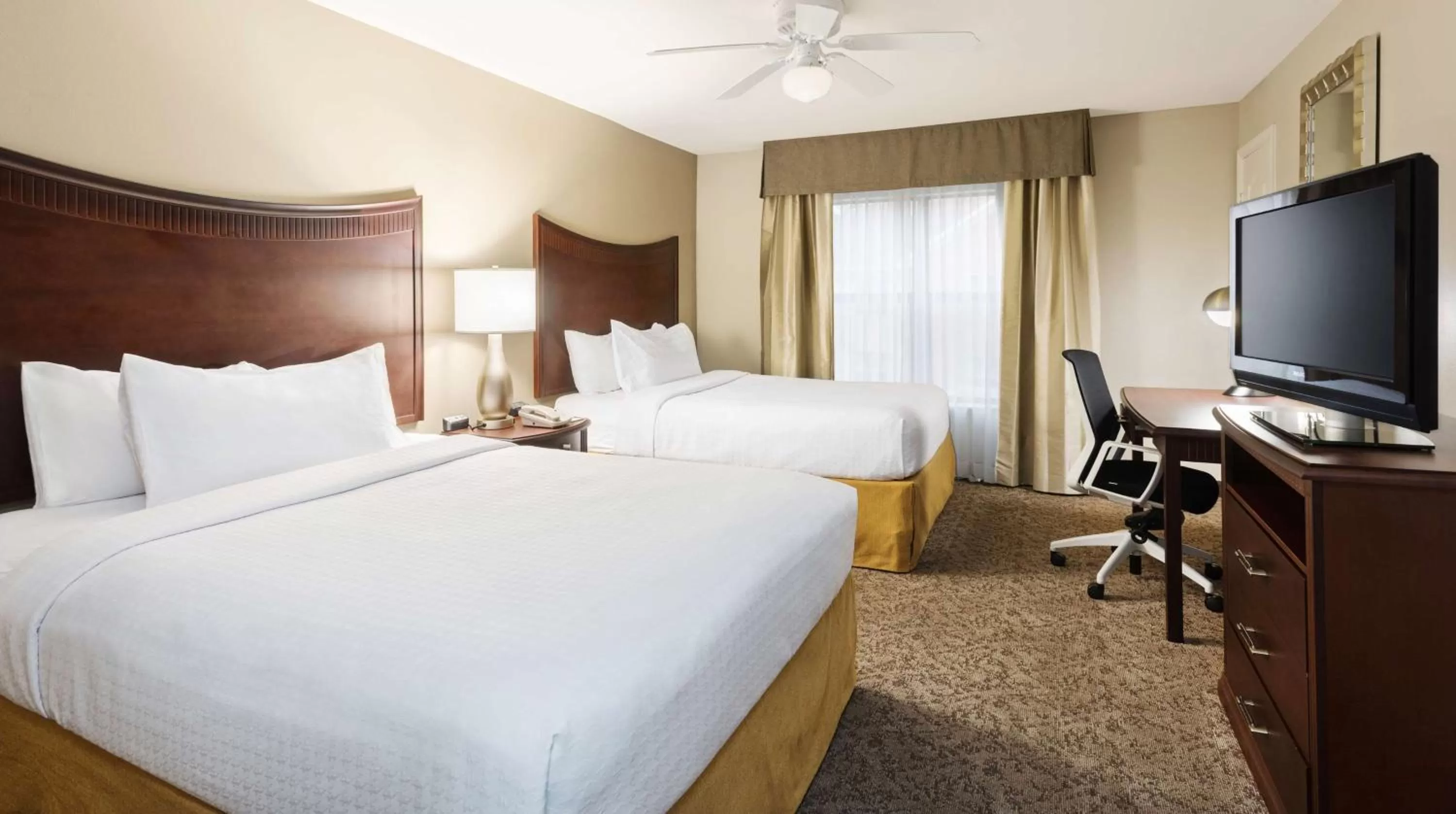 Bed in Homewood Suites by Hilton Shreveport