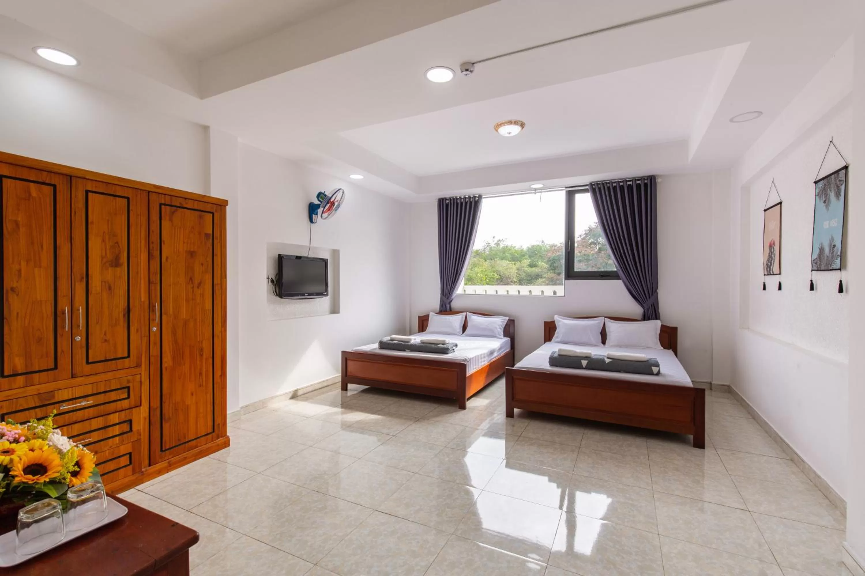 Bed in Hotel Hoa Cúc Phương Dĩ An - Bình Dương