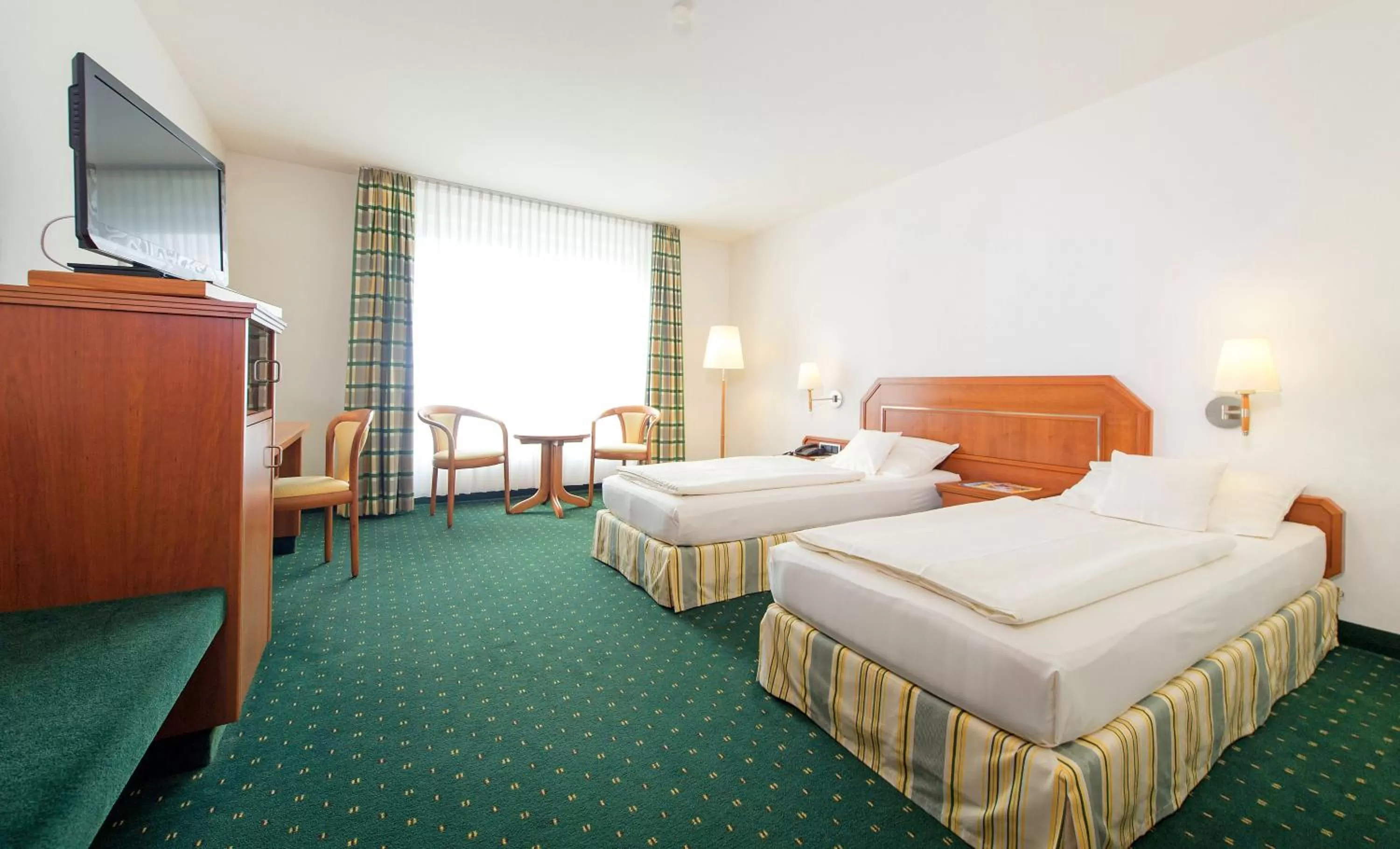 Photo of the whole room, Bed in Maifeld Sport- und Tagungshotel