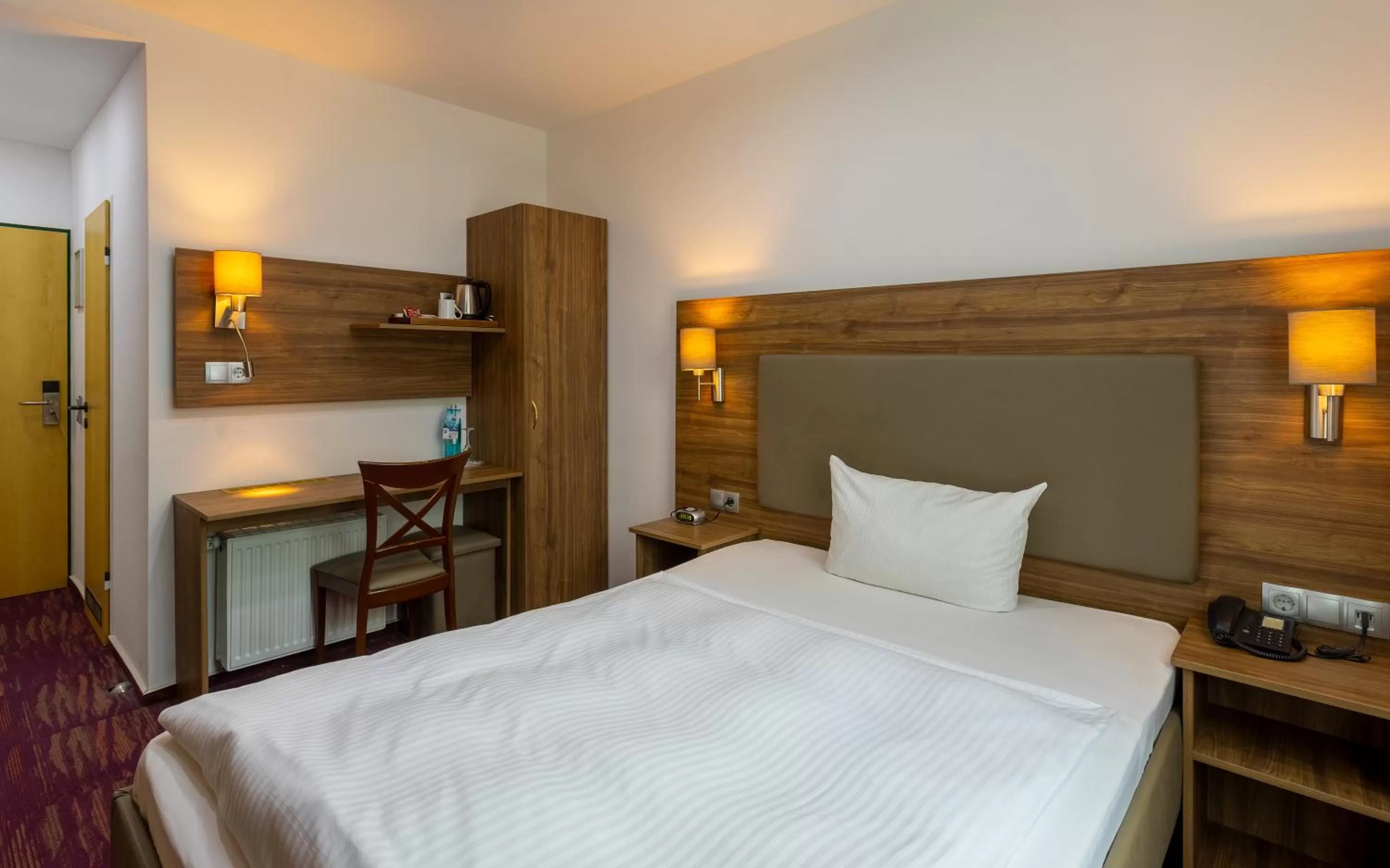 Photo of the whole room, Bed in Waldhotel Eskeshof