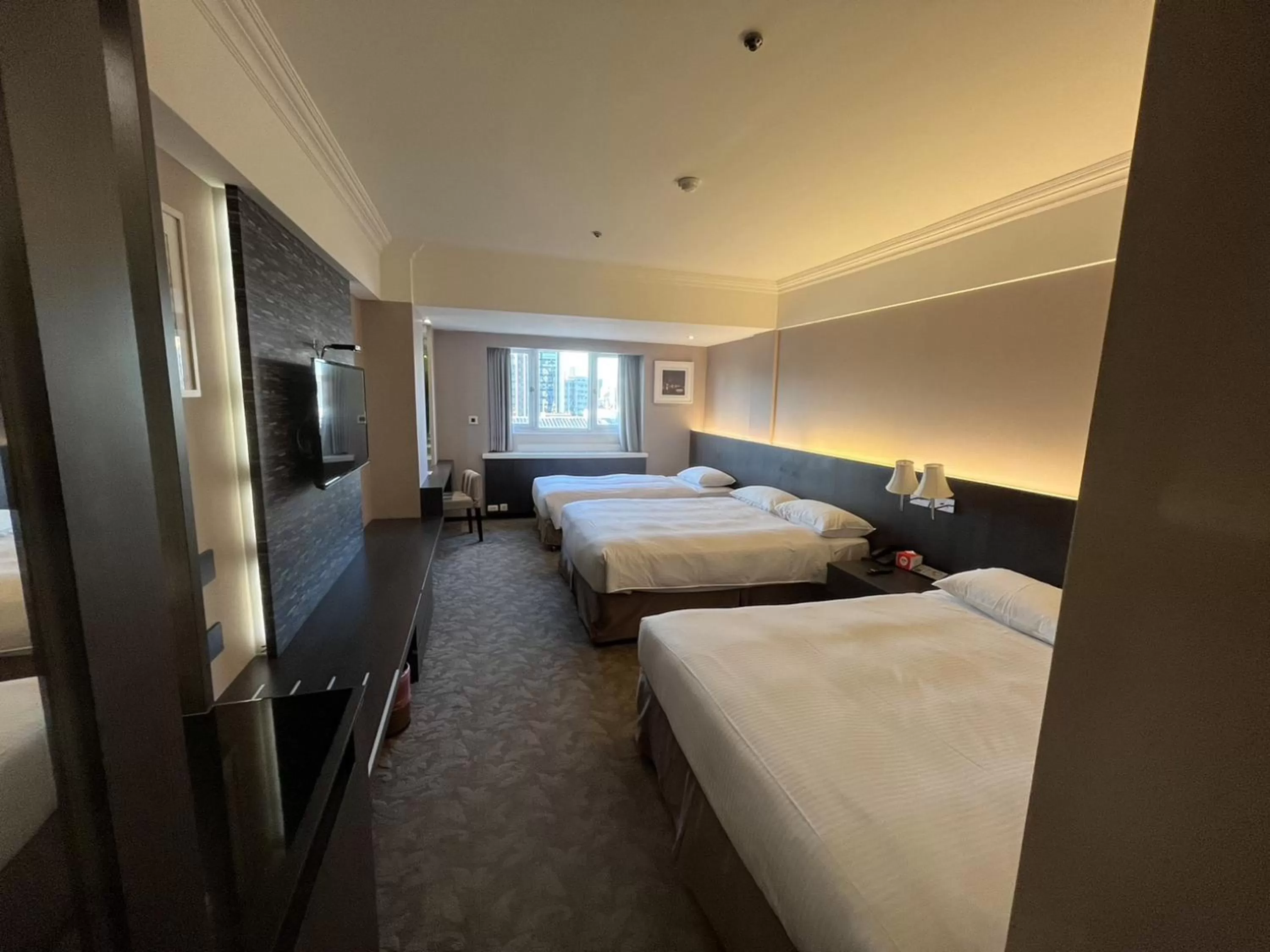 Communal lounge/ TV room, Bed in Guide Hotel Kaohsiung Liuhe