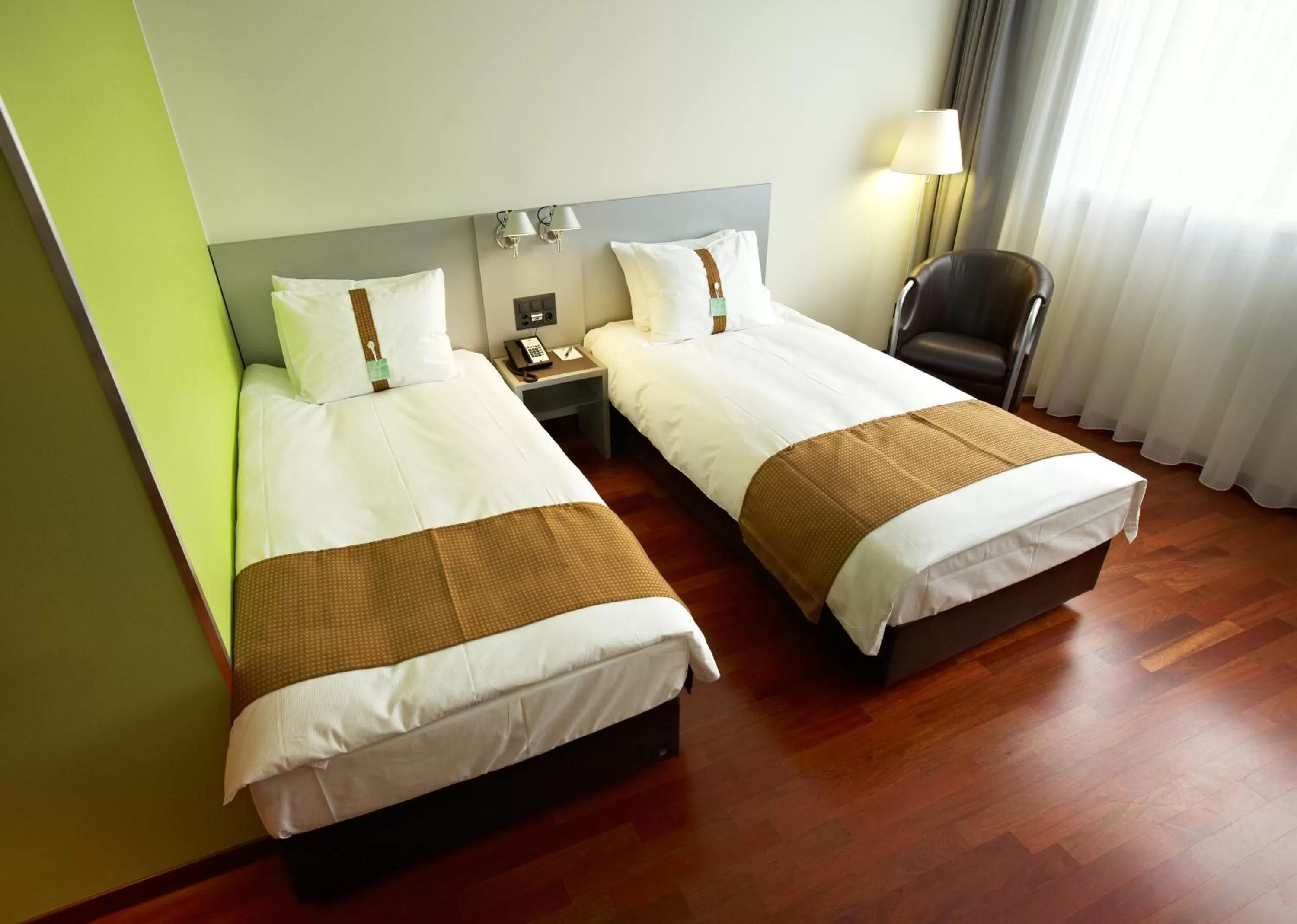 Photo of the whole room, Bed in Holiday Inn Zürich Messe by IHG