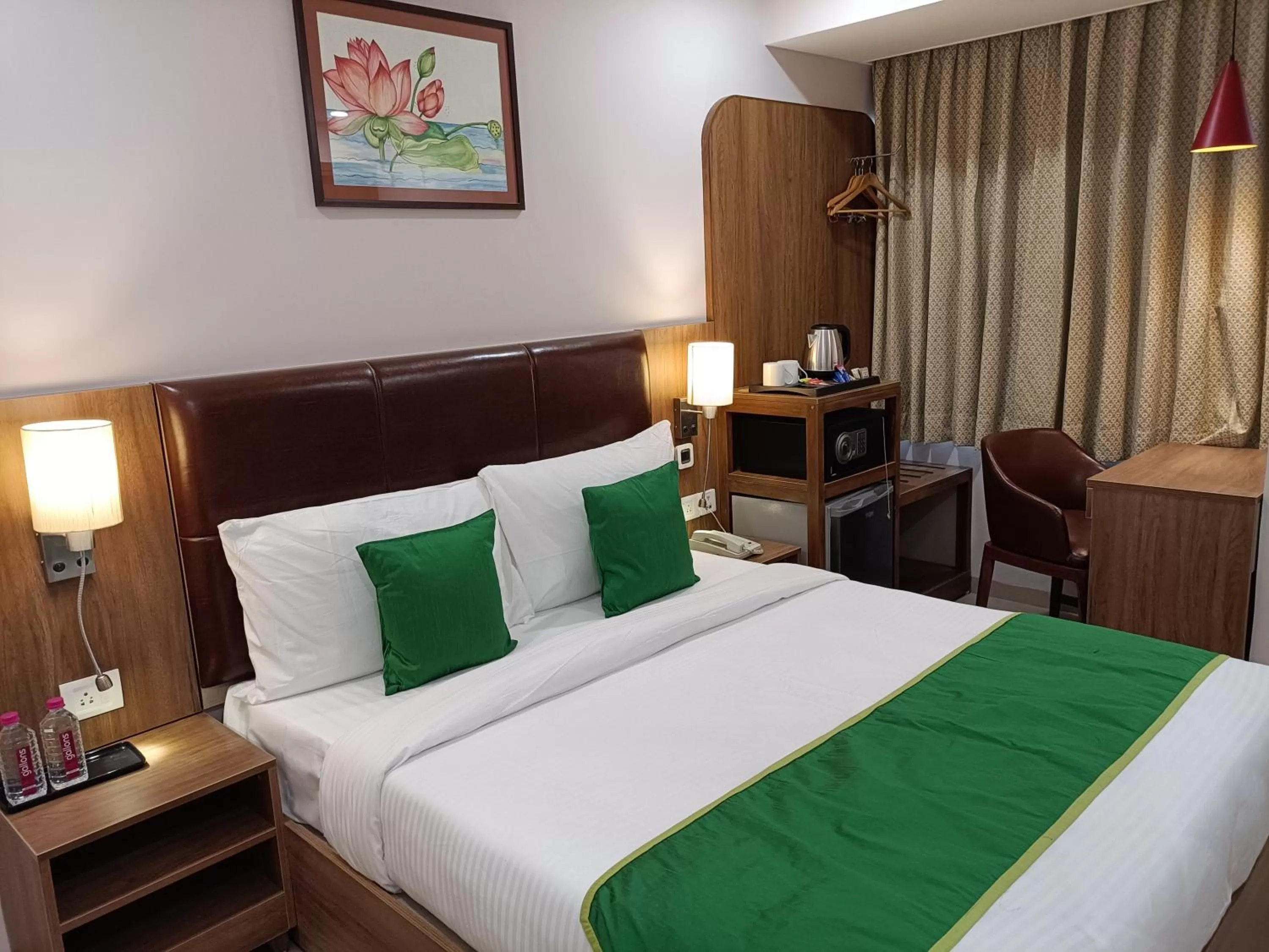 Bed in The Beacon Hotel Vadodara