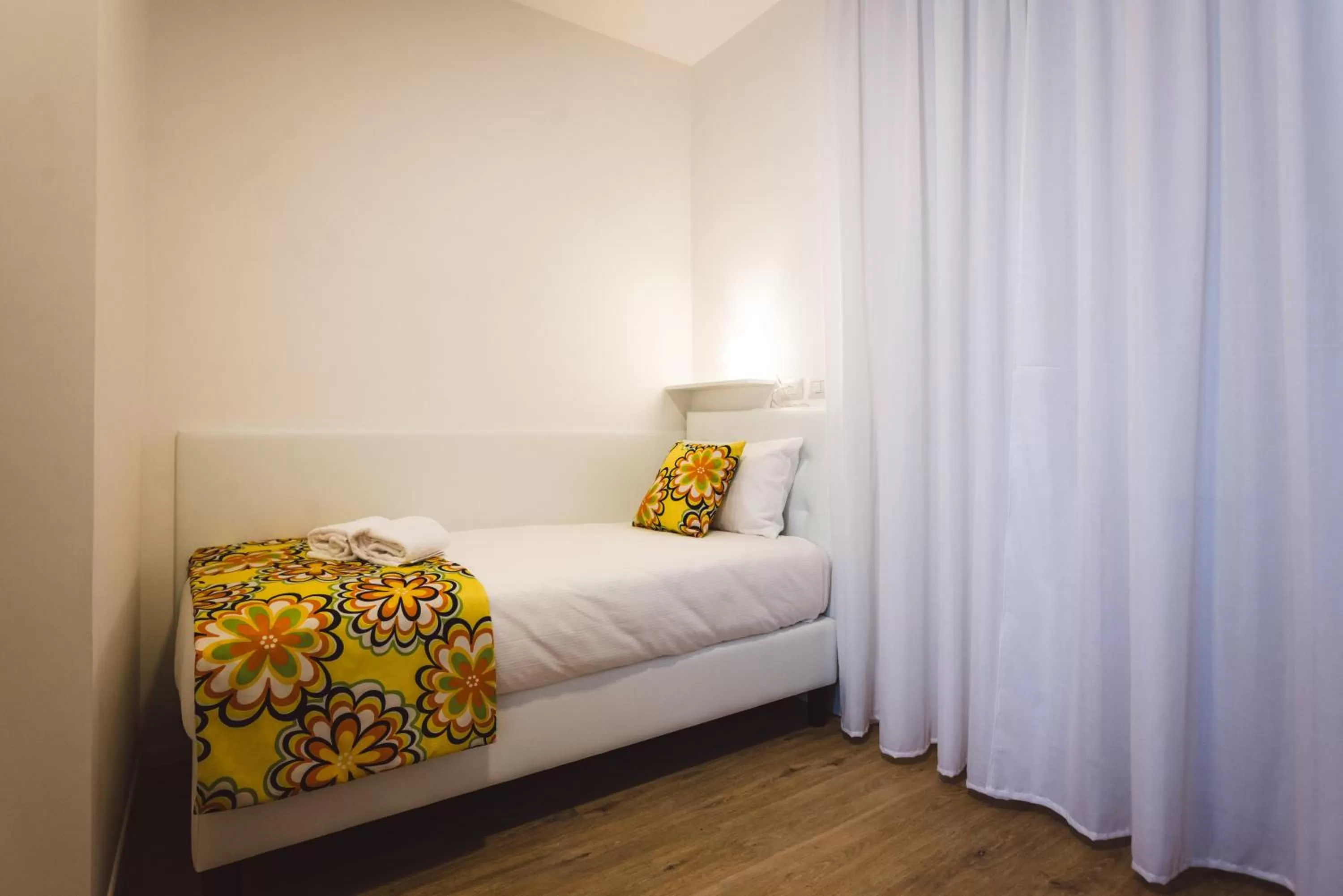 Bed in Angelina Rooms in Rome