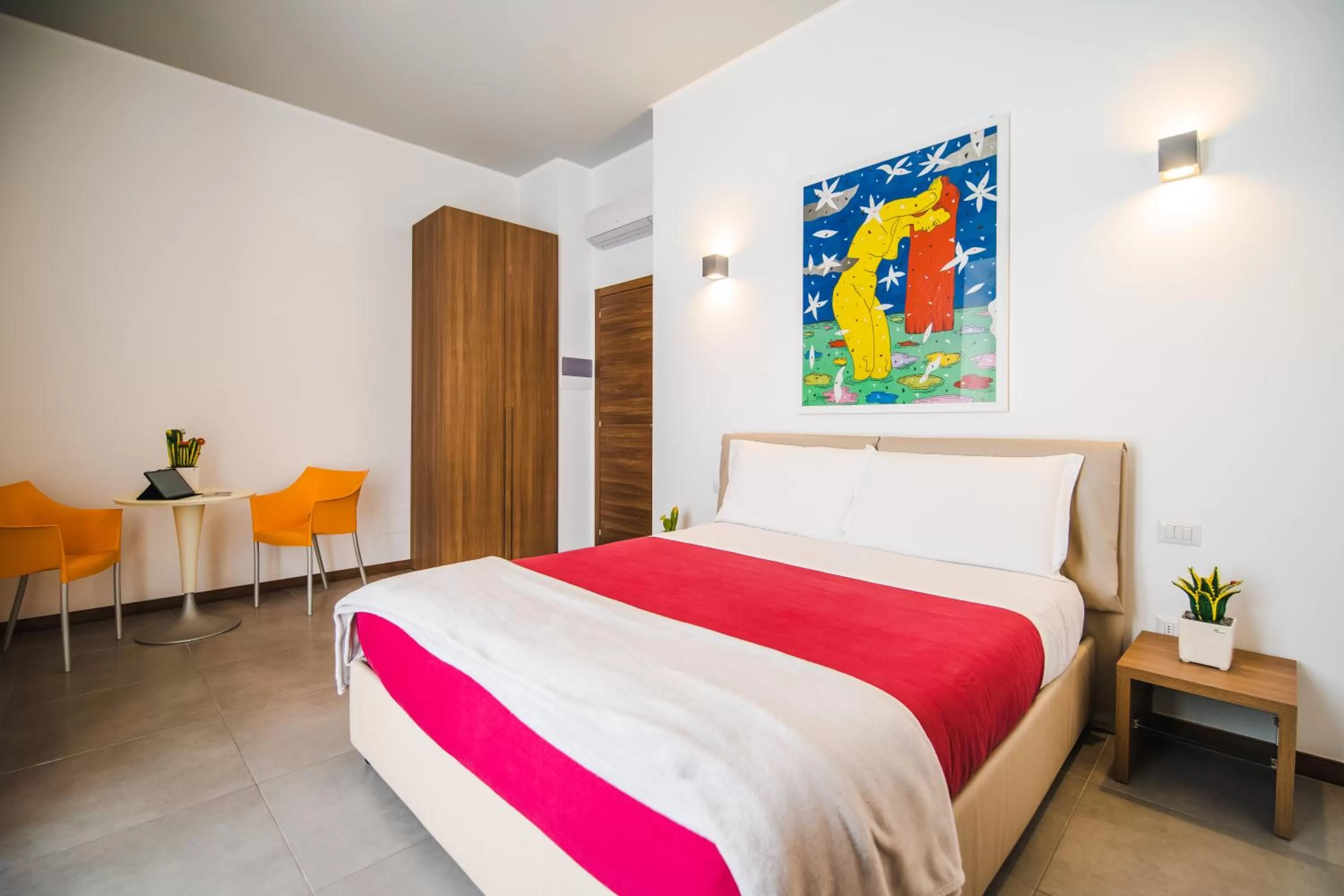 Photo of the whole room, Bed in Arco Dei Pinto