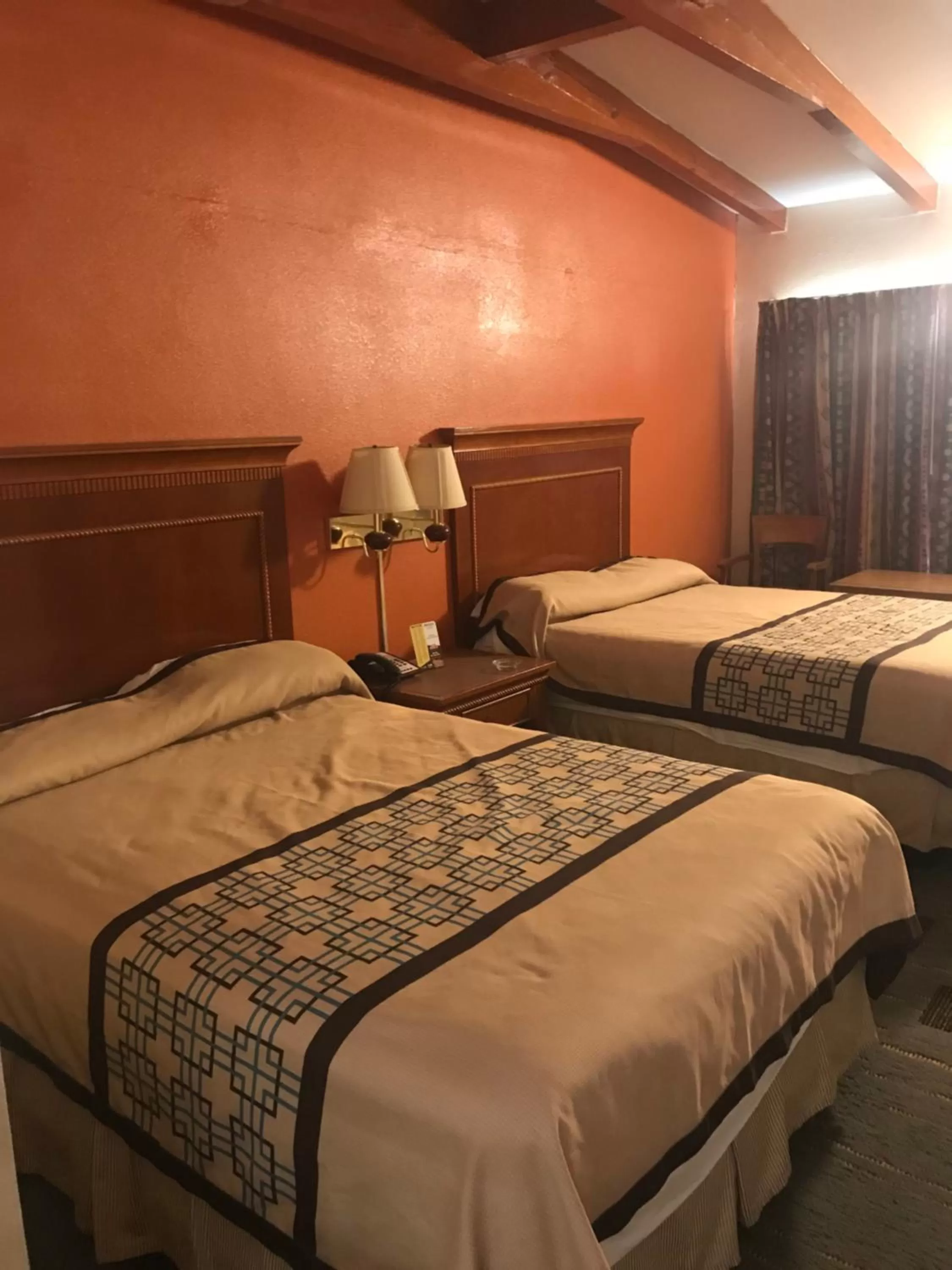 Bed in Wayfarer Motel