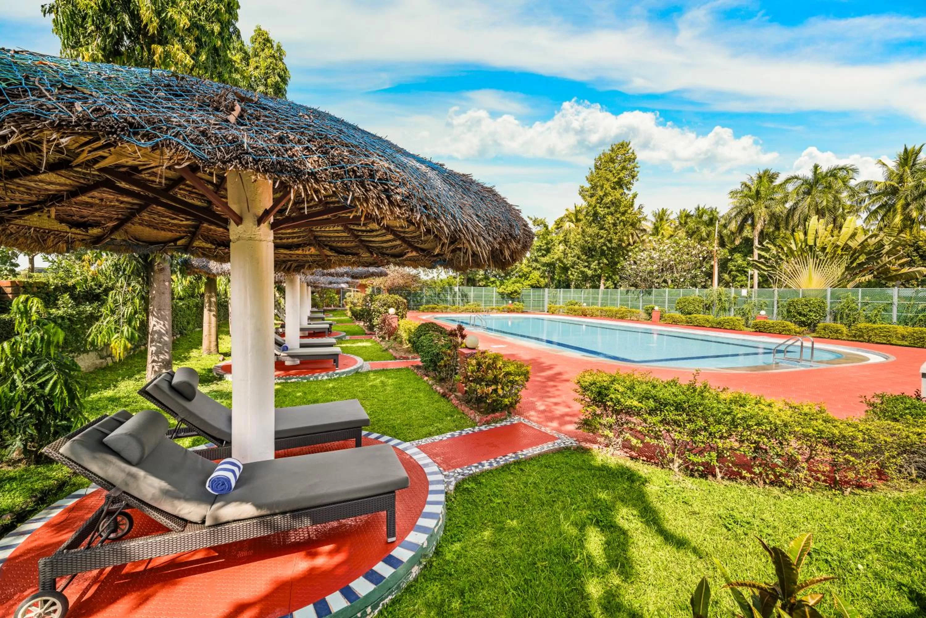 Garden view, Swimming Pool in GReaT Trails Riverview Thanjavur By GRT Hotels