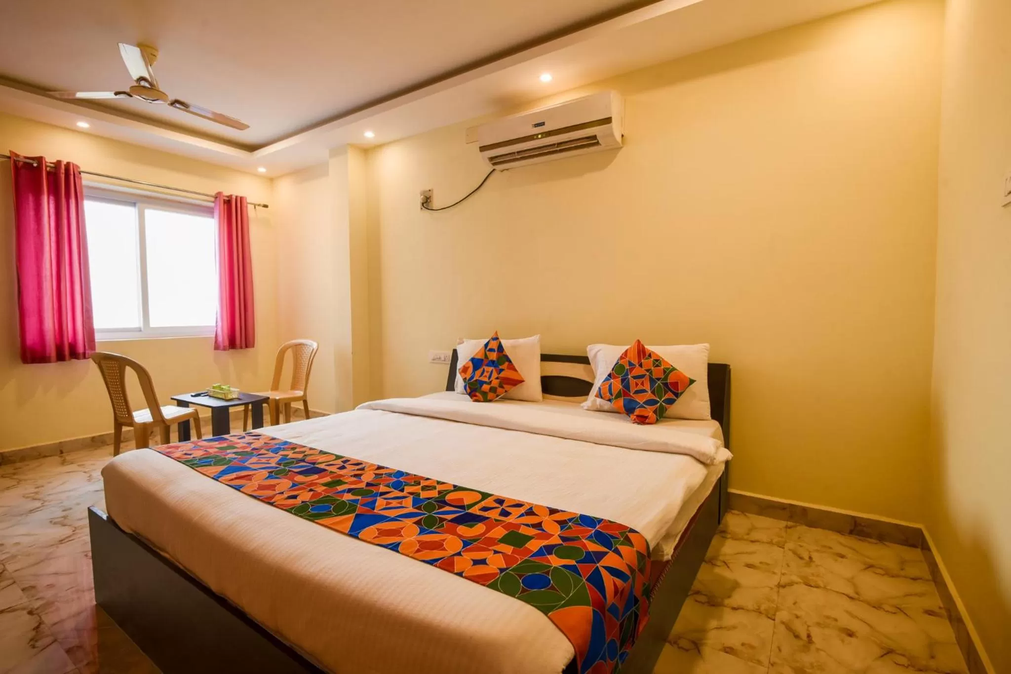 Bed in FabHotel The Fortune Inn