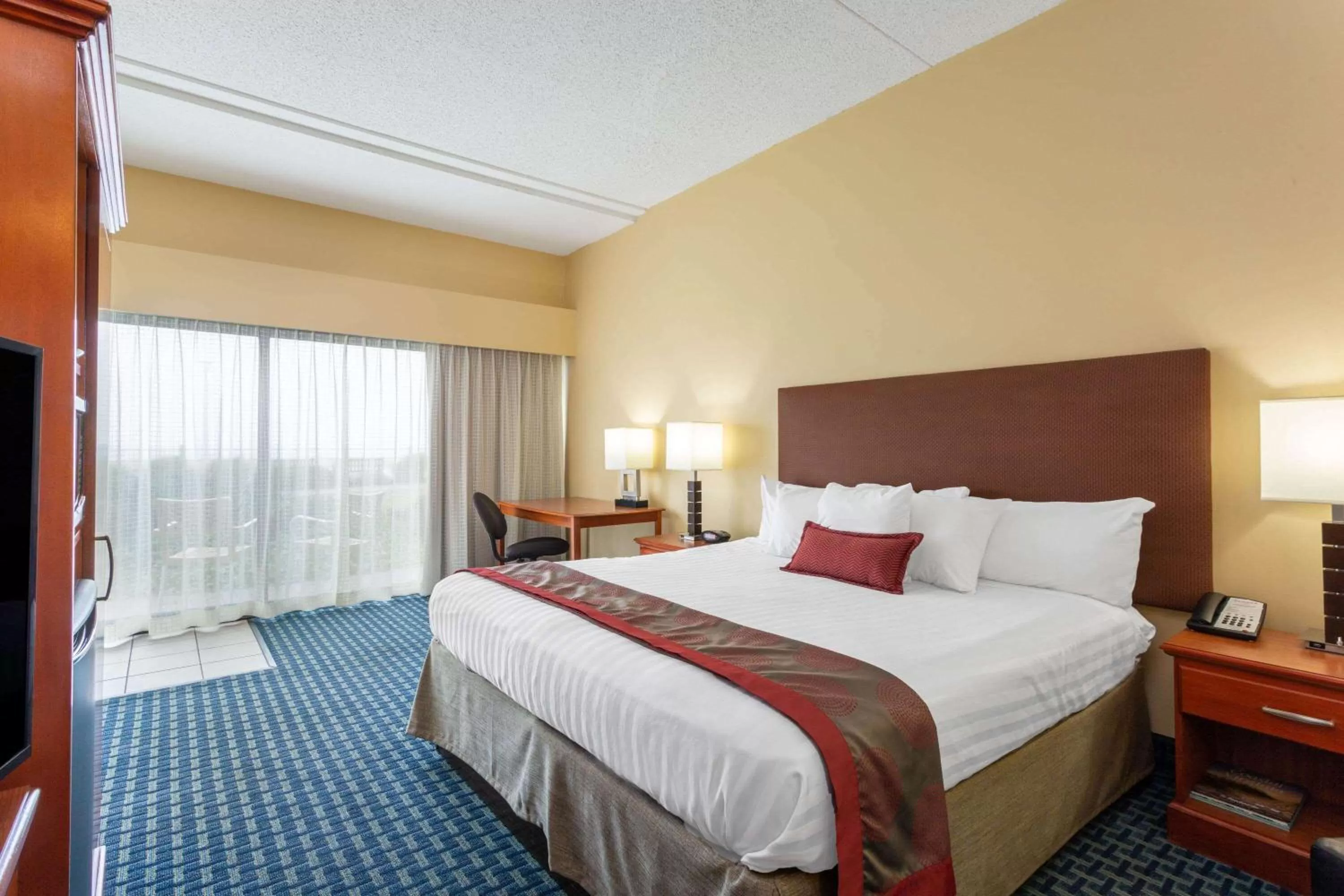 Photo of the whole room, Bed in Ramada Plaza by Wyndham Virginia Beach Oceanfront