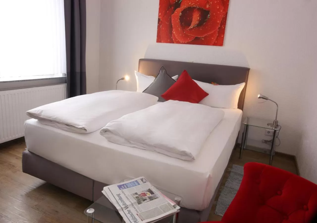 Bed in Hotel Rosenhof GmbH