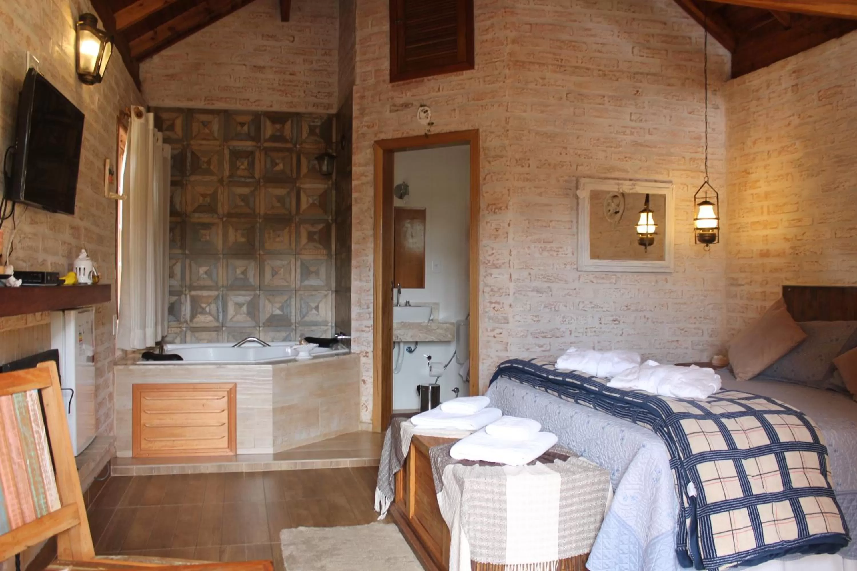 Bed in Pousada Canto do Sabiá