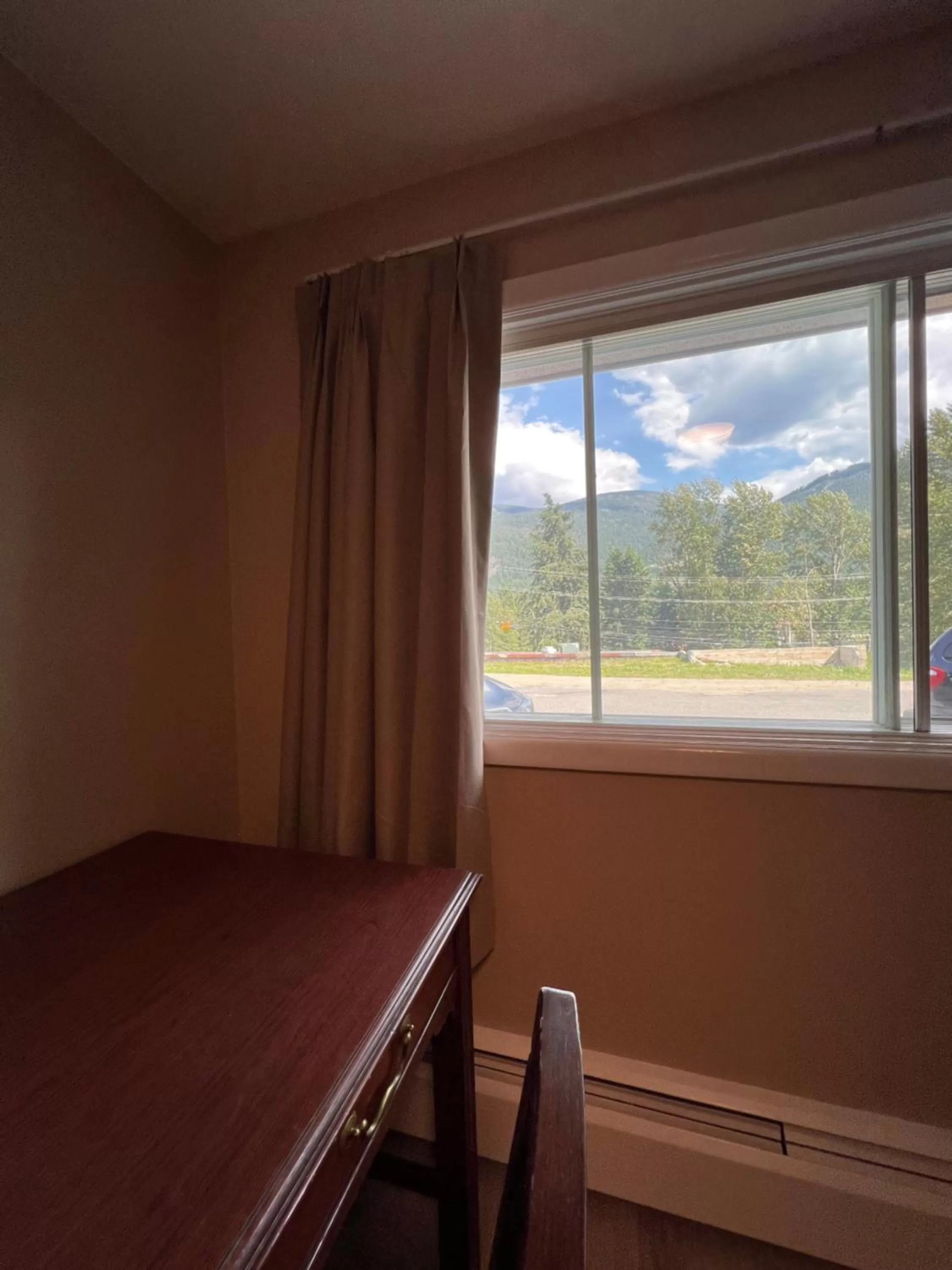 View (from property/room), Bed in Villa Motel