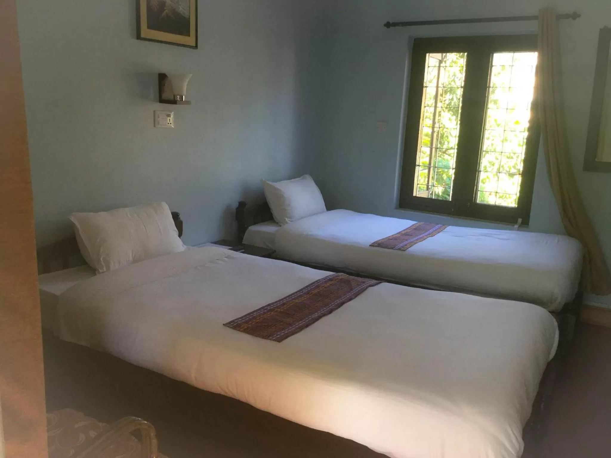 Bed in Yeti Guest House