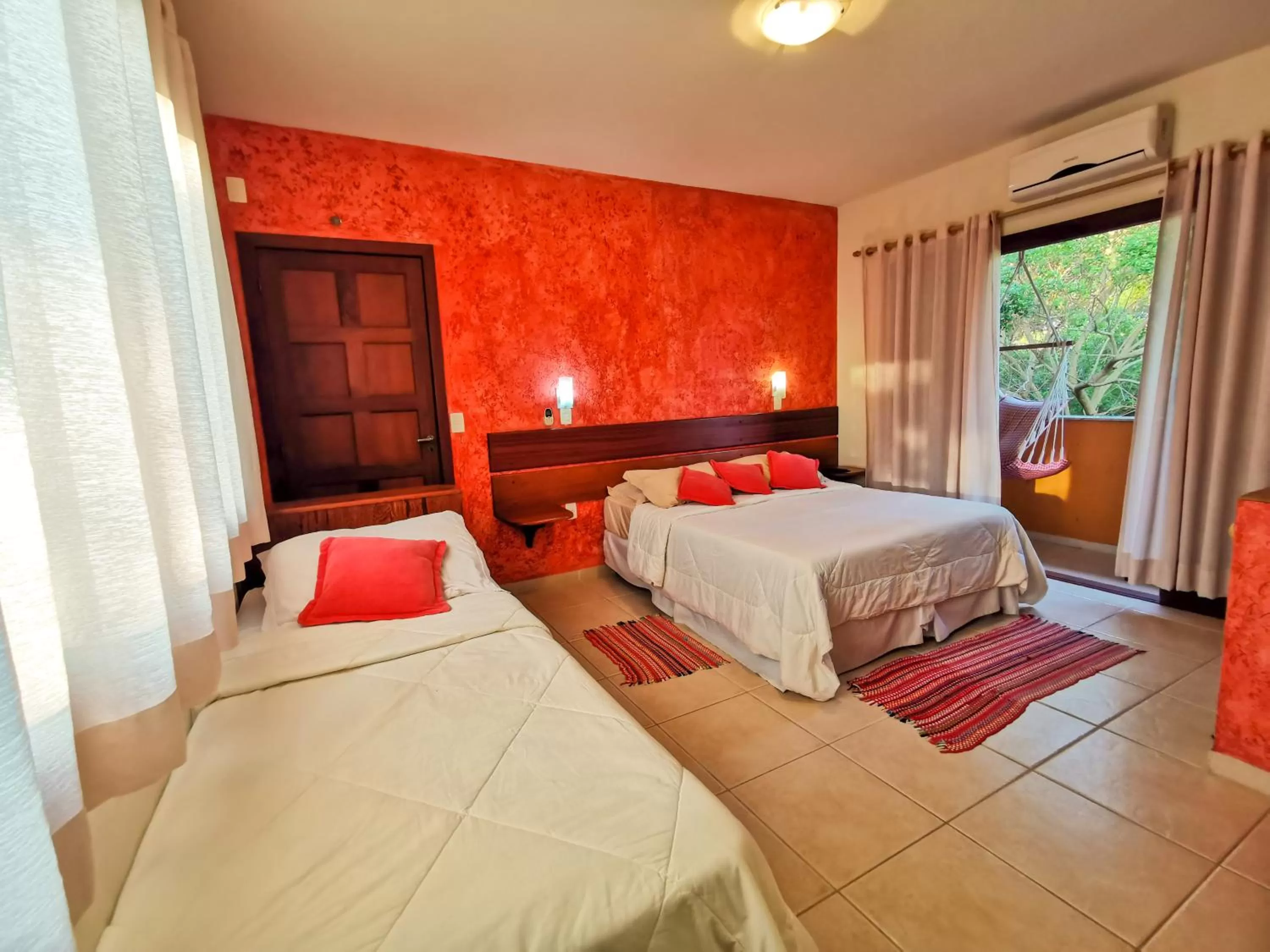 Bed in Pousada Ilha dos Anjos